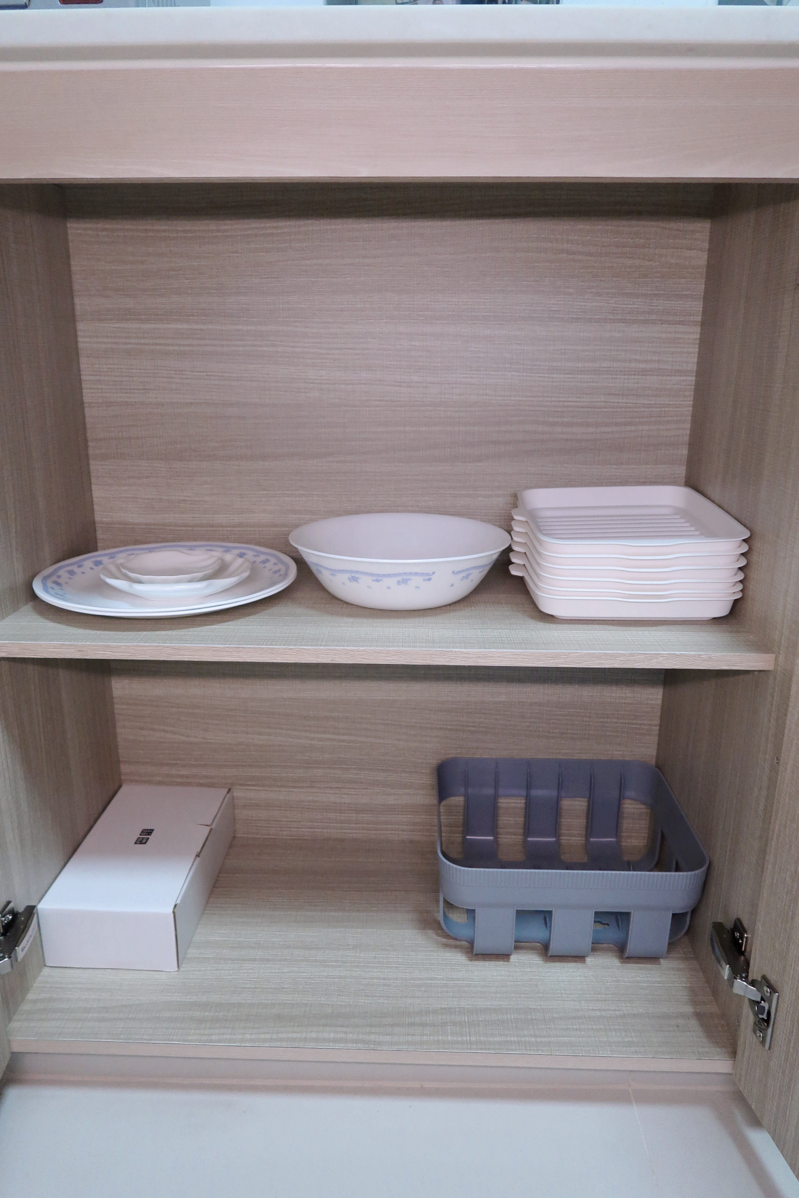 Our Enclosed Kitchen Organisation With Plenty Storage  - Wooden kitchen cabinet, neatly organized dishes, white plates and