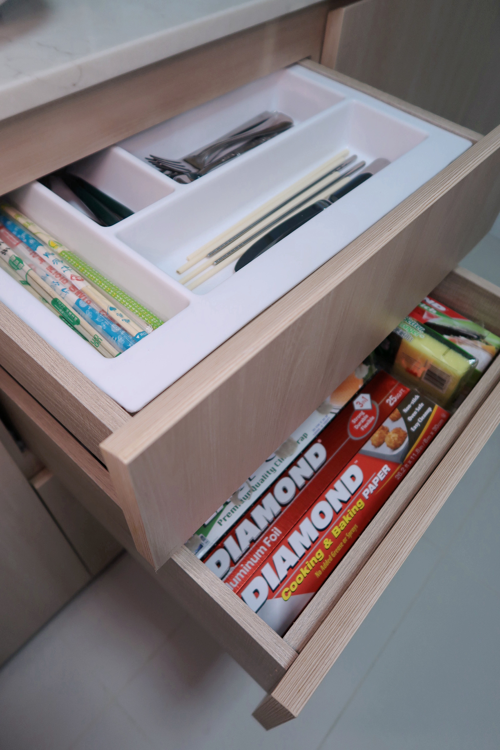 Our Enclosed Kitchen Organisation With Plenty Storage  - Wooden drawer with neatly organized compartments, containing various