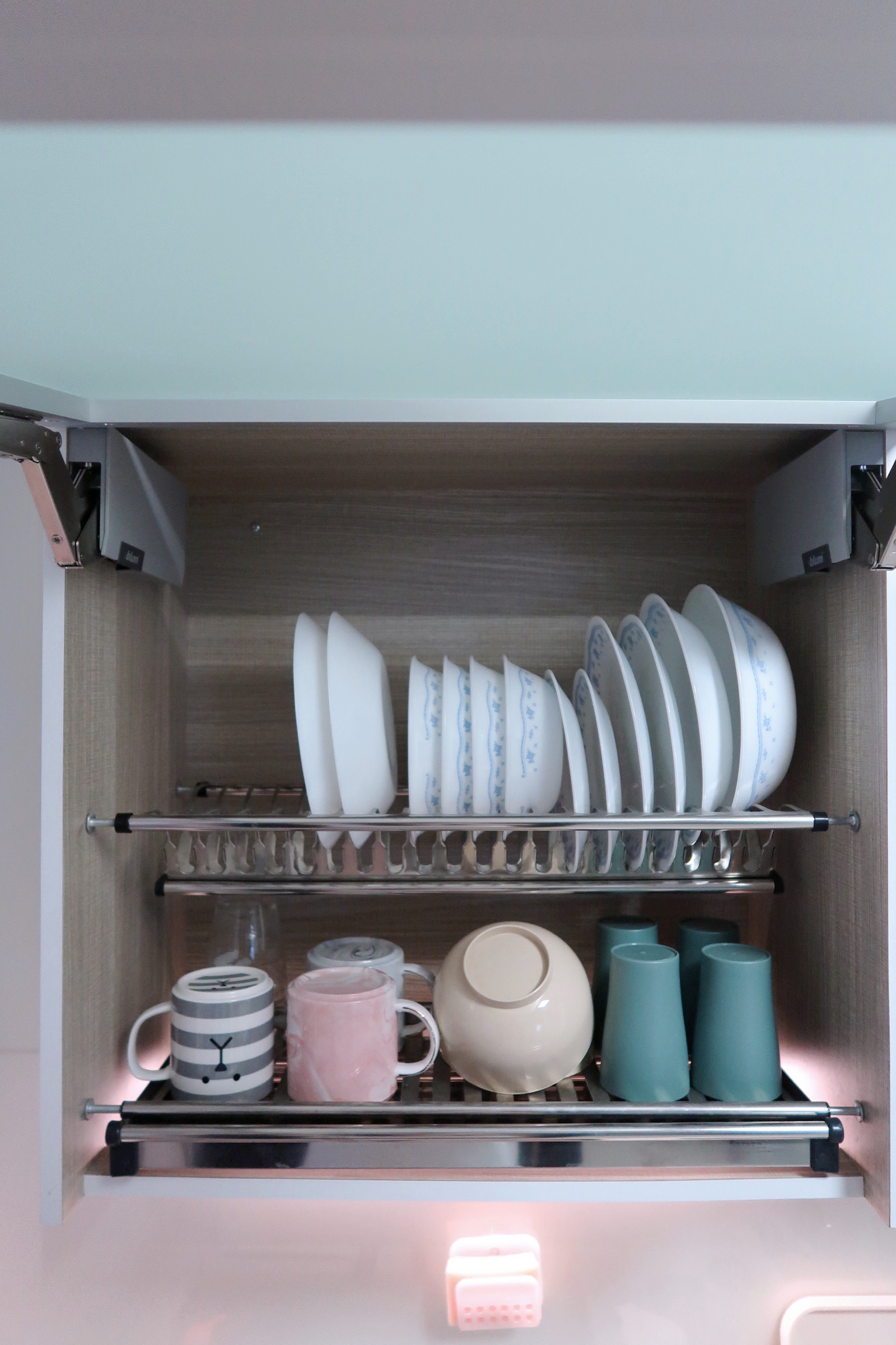 Our Enclosed Kitchen Organisation With Plenty Storage  - Dishes neatly arranged on a shelf, ceramic plates and bowls