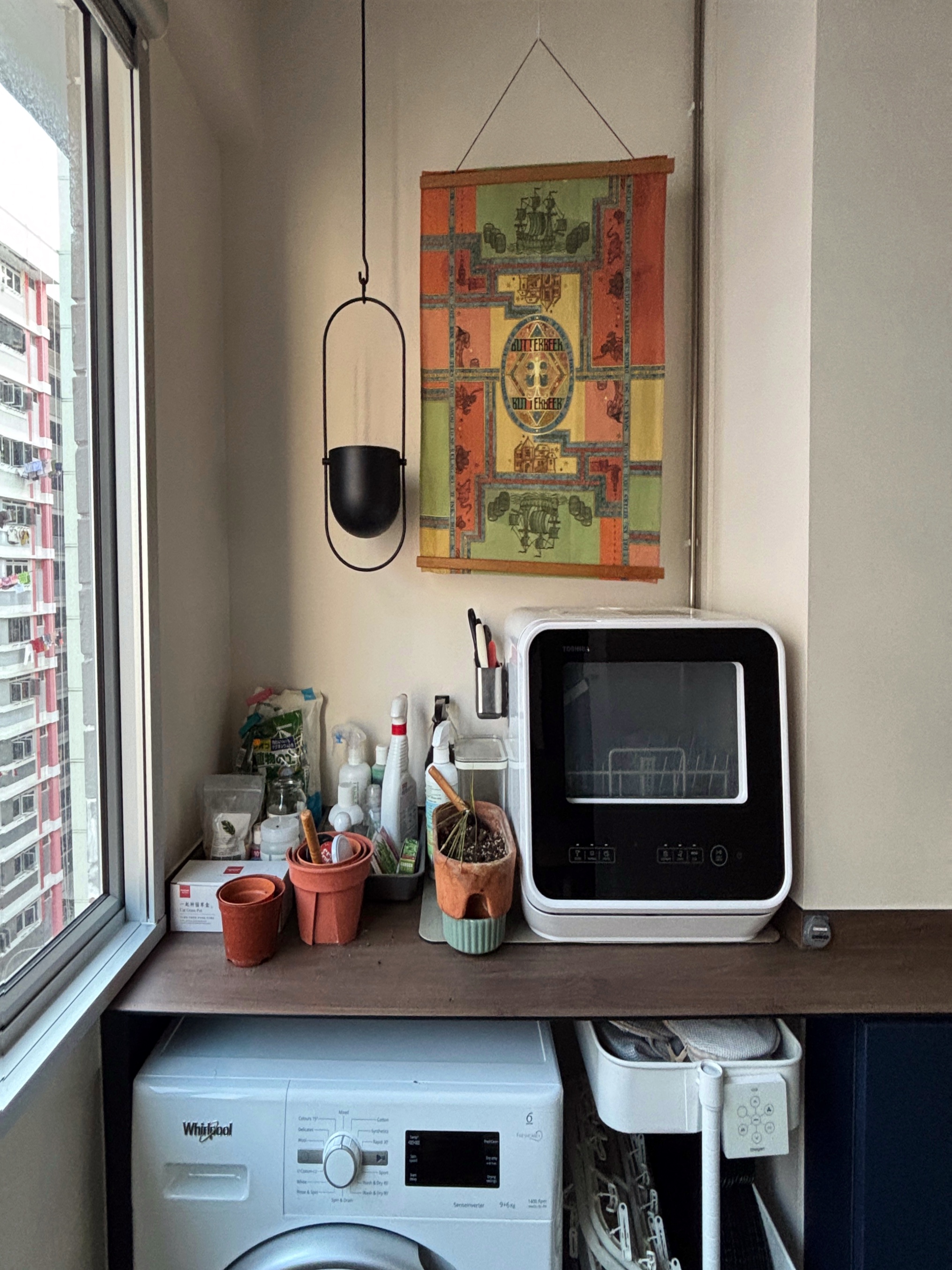 Organising Our Plant Care Corner - microwave, laundry, window, plants, laundry detergent, soap, cleaning supplies, white