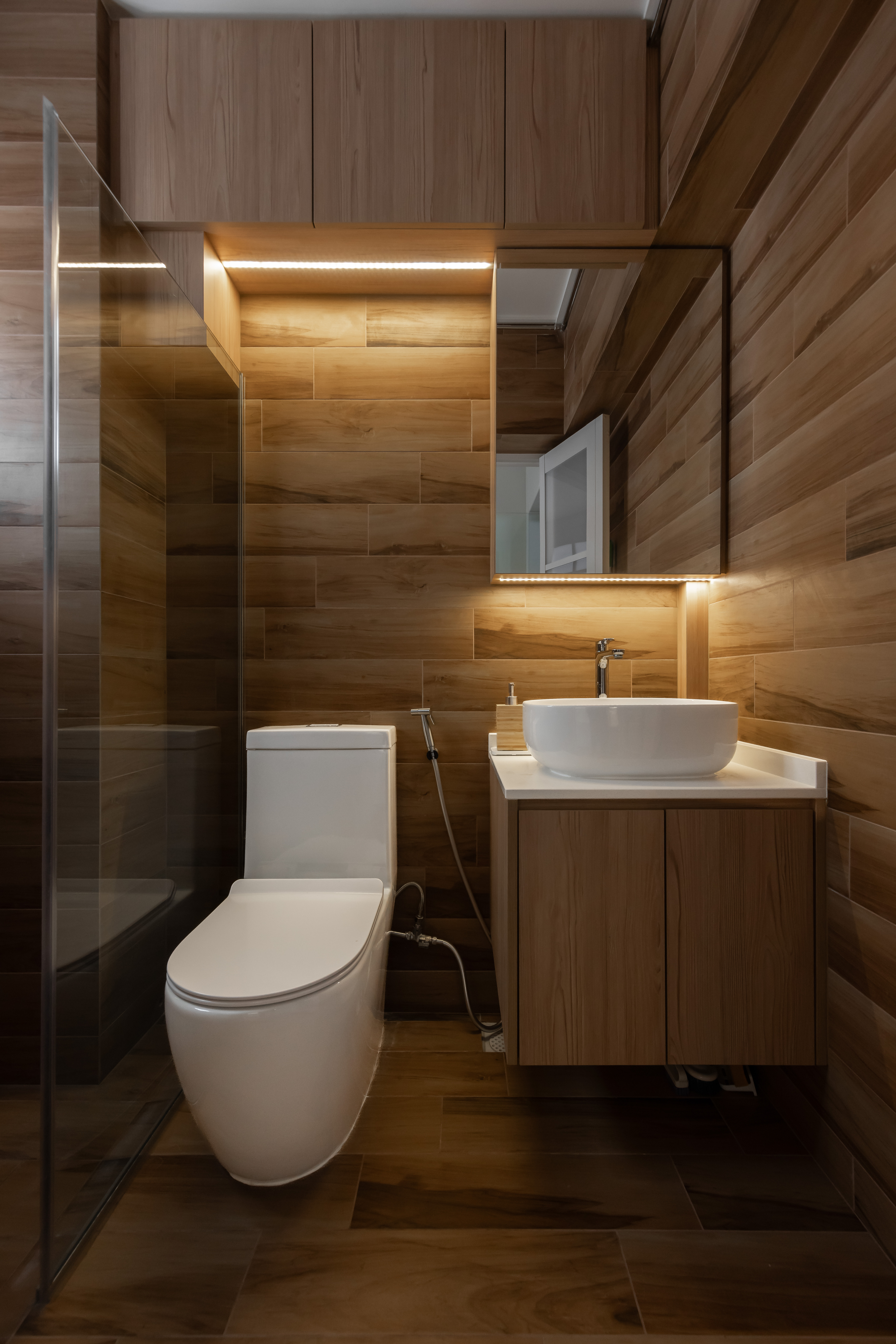 Creating Cozy Spaces: The Magic of LED Strip Lights - Wooden bathroom, modern design, sleek fixtures, minimalist decor