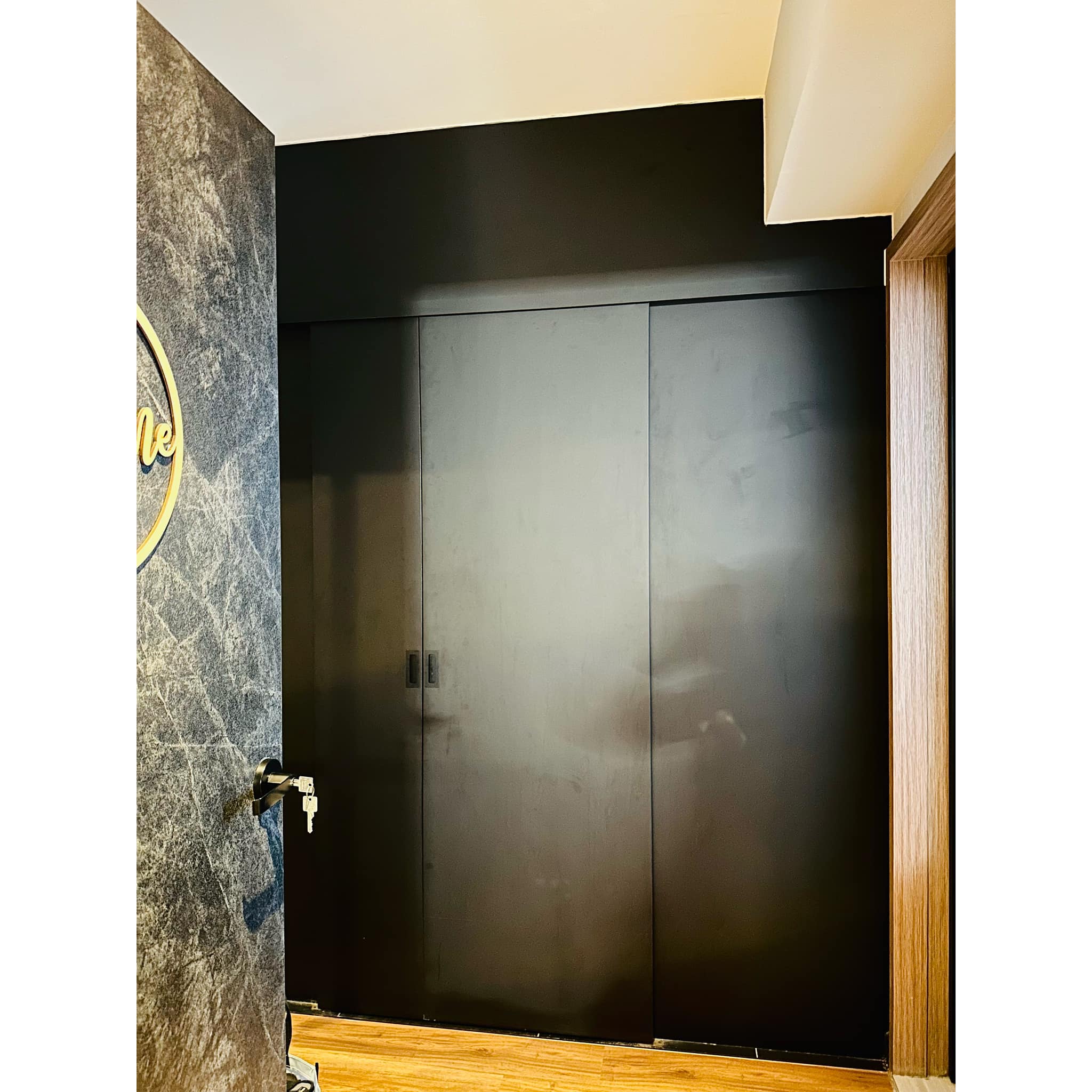 The Work-Play Balance: An Anime & Marvel Collector's Dream Workplace  - Dark gray textured wall, modern design, minimalist