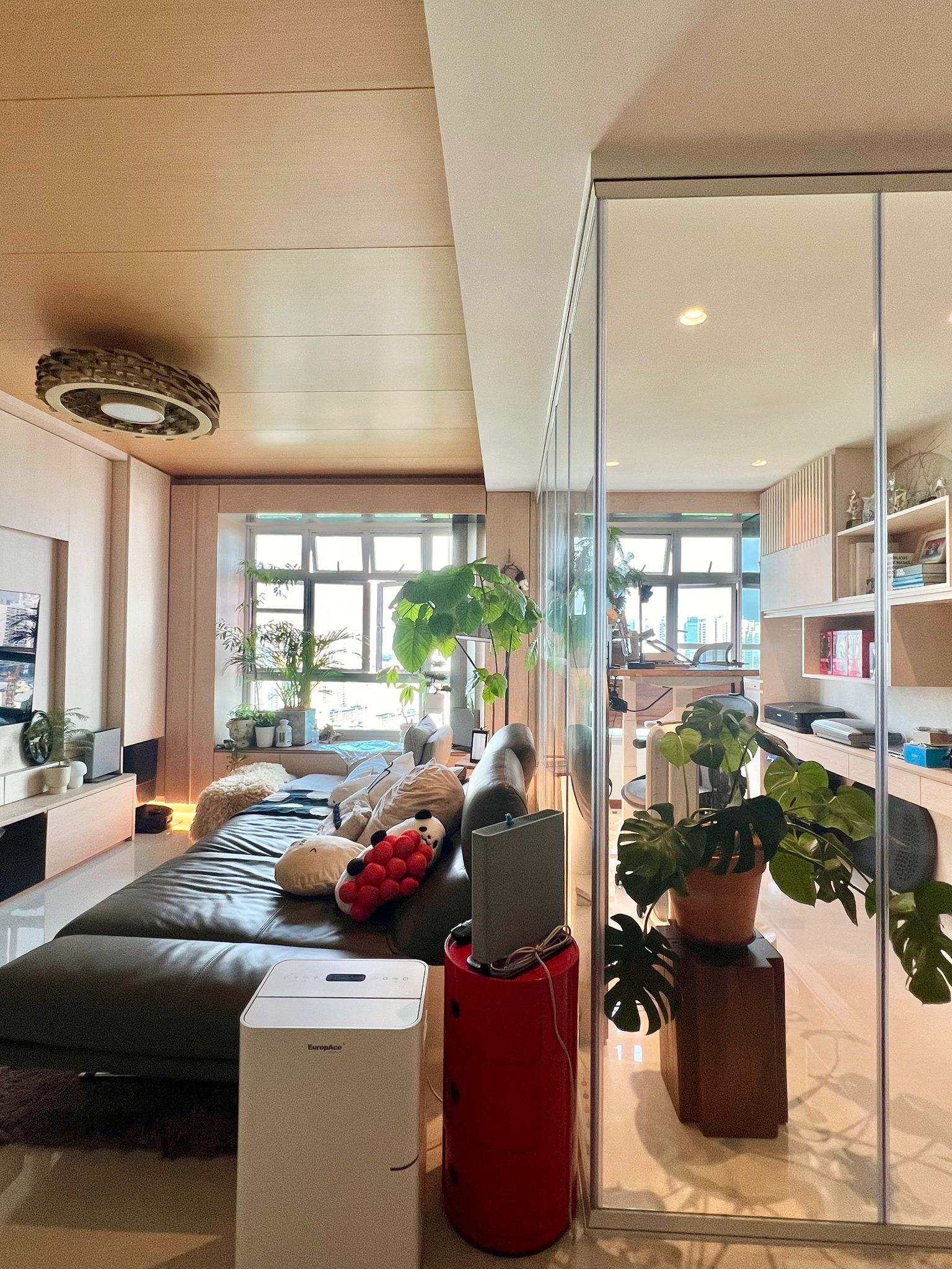 Blending Timeless Elegance: Our own Japanese-Inspired Modern Home - Modern living room with large windows, sleek furniture