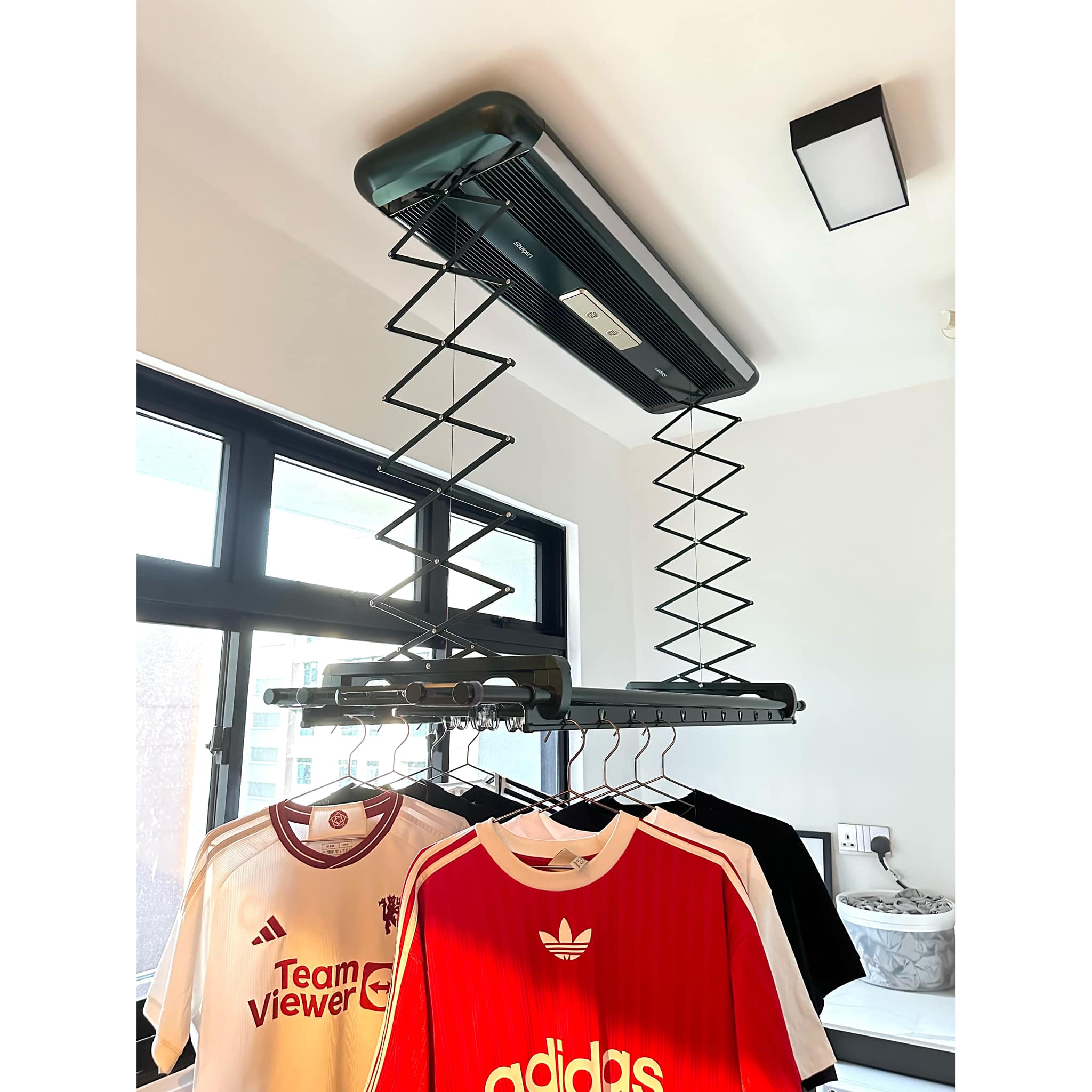 Maximising A Small Yet Functional Service Yard In Our Kitchen - Air conditioner unit mounted on wall, black and silver color