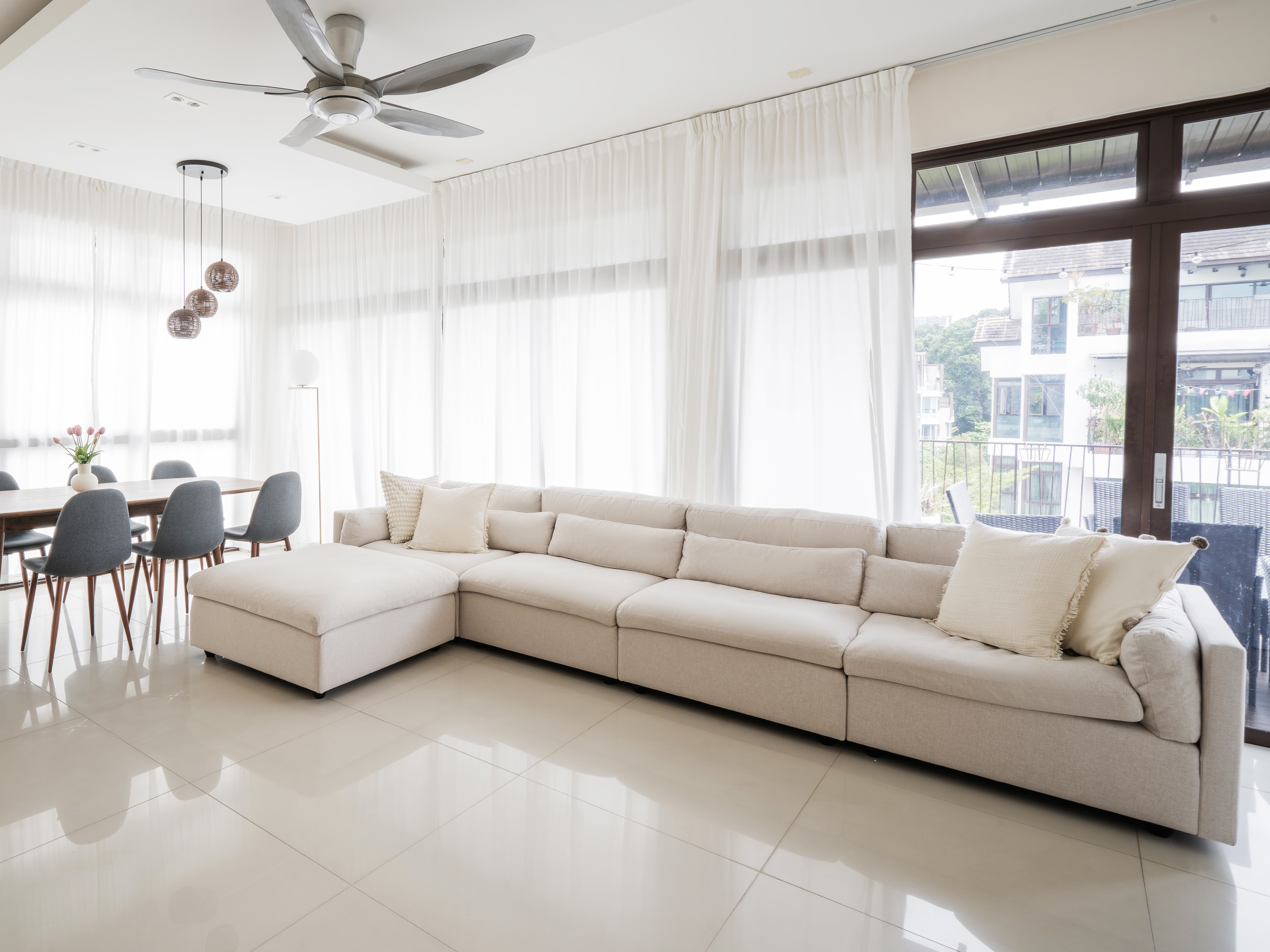 Bright and airy living room: The heart of our home - Modern minimalist living room with large beige sectional sofa