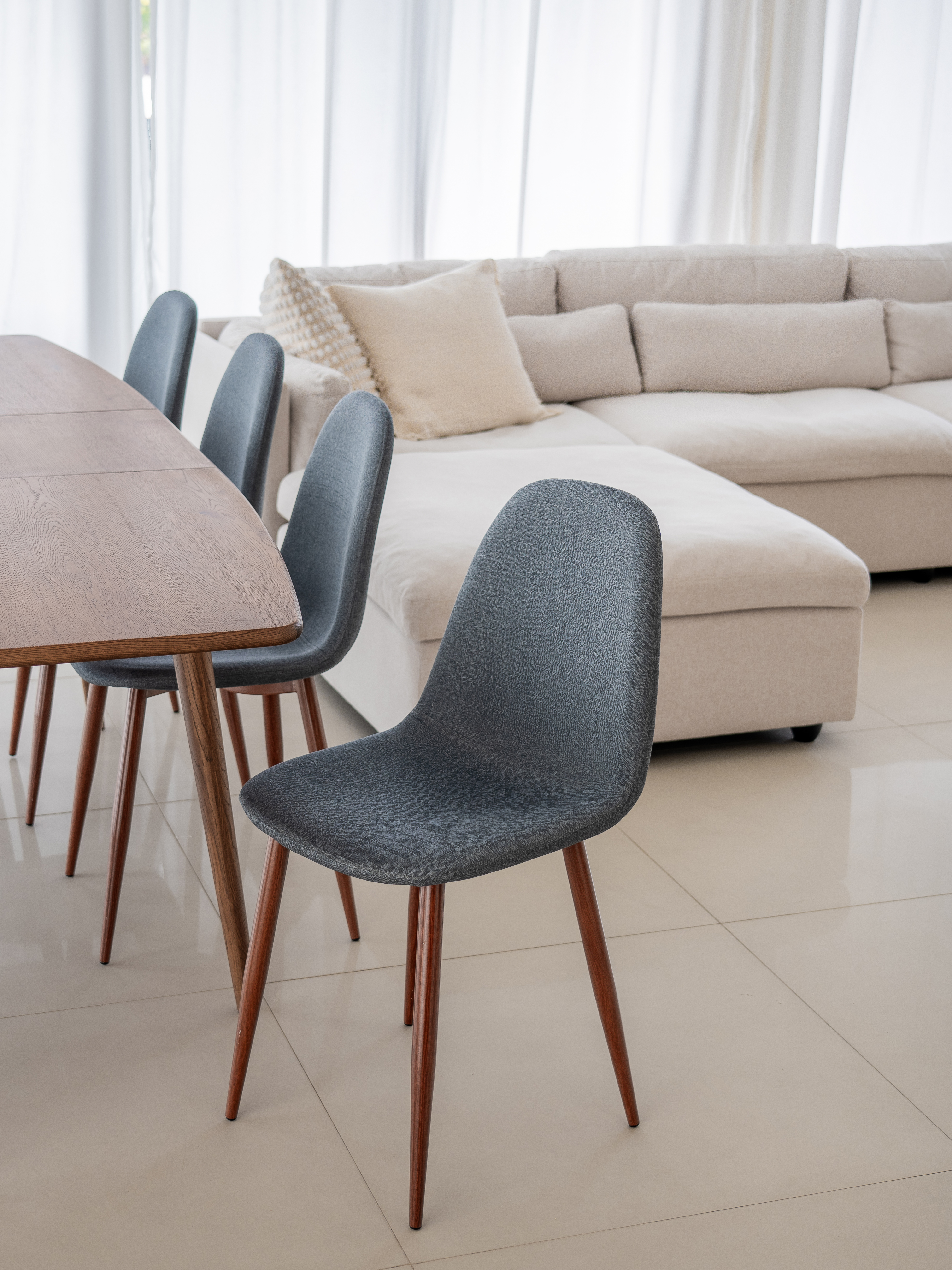 Bright and airy living room: The heart of our home - Modern dining room, minimalist design, wooden dining table, contemporary