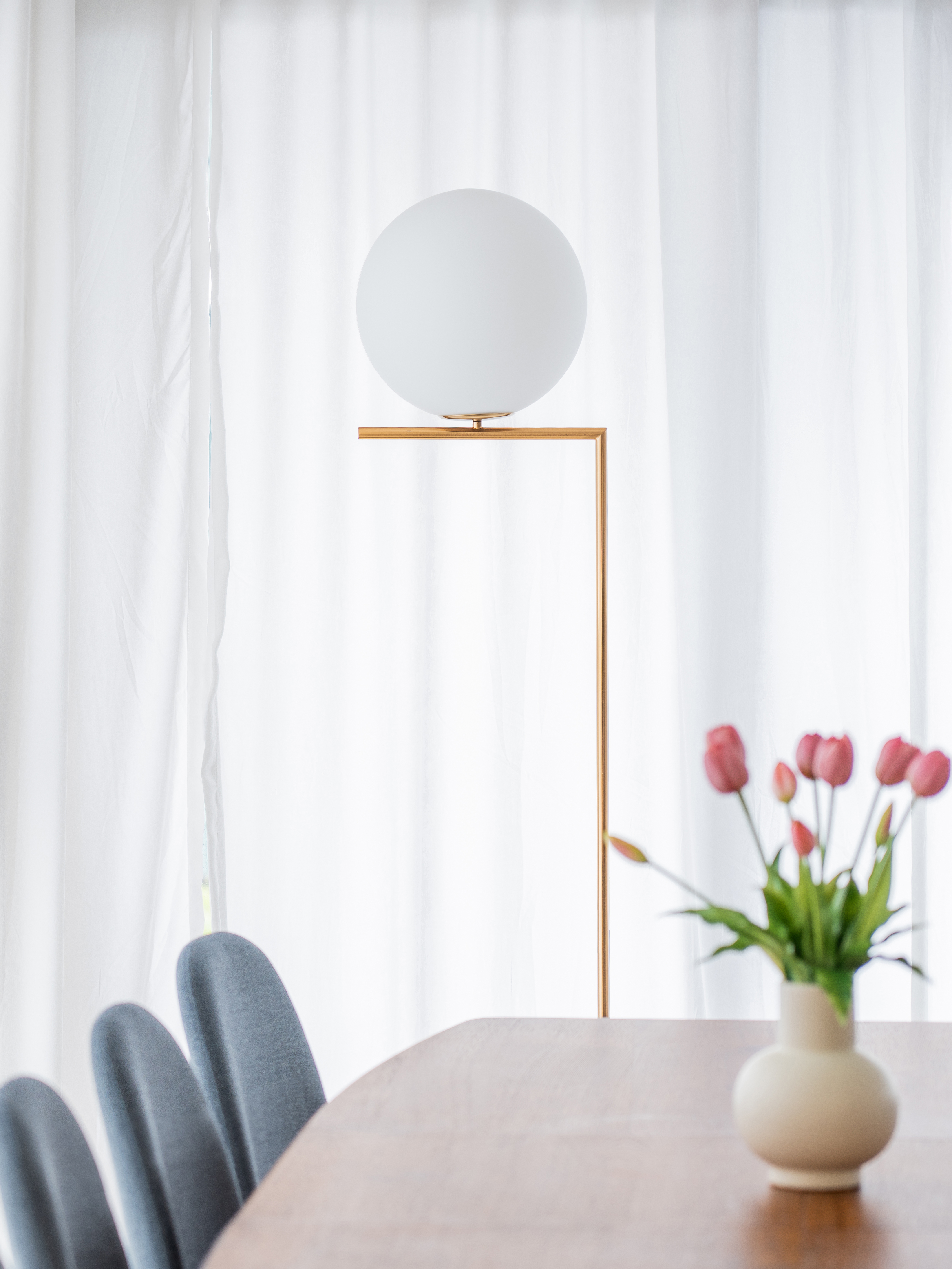 Bright and airy living room: The heart of our home - White sheer curtains, minimalist decor, modern table setting, wooden