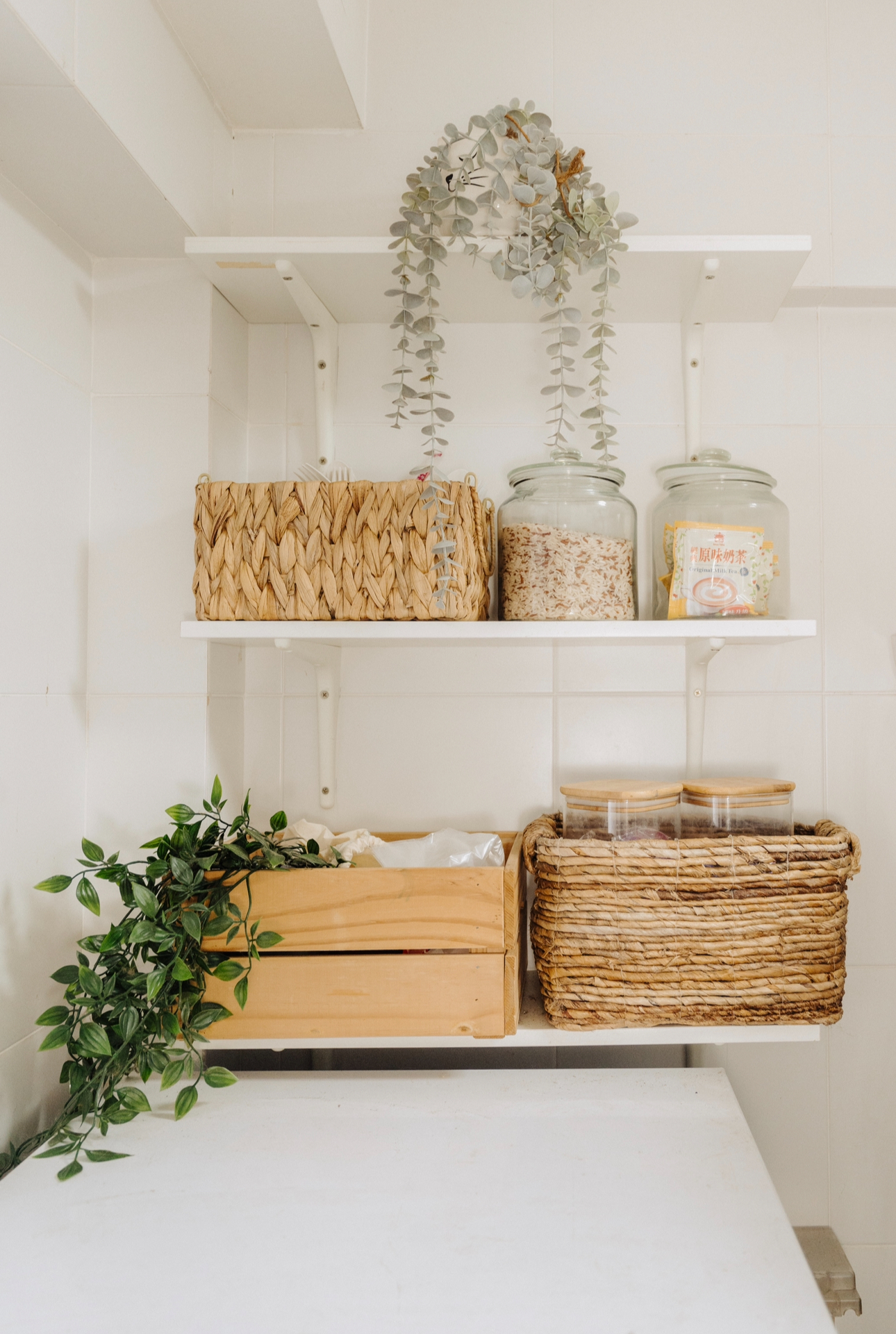 Tiny Kitchen Living: Organisation Tips To Live Mess Free - White tiled wall, minimalist kitchen, wooden countertop, natural