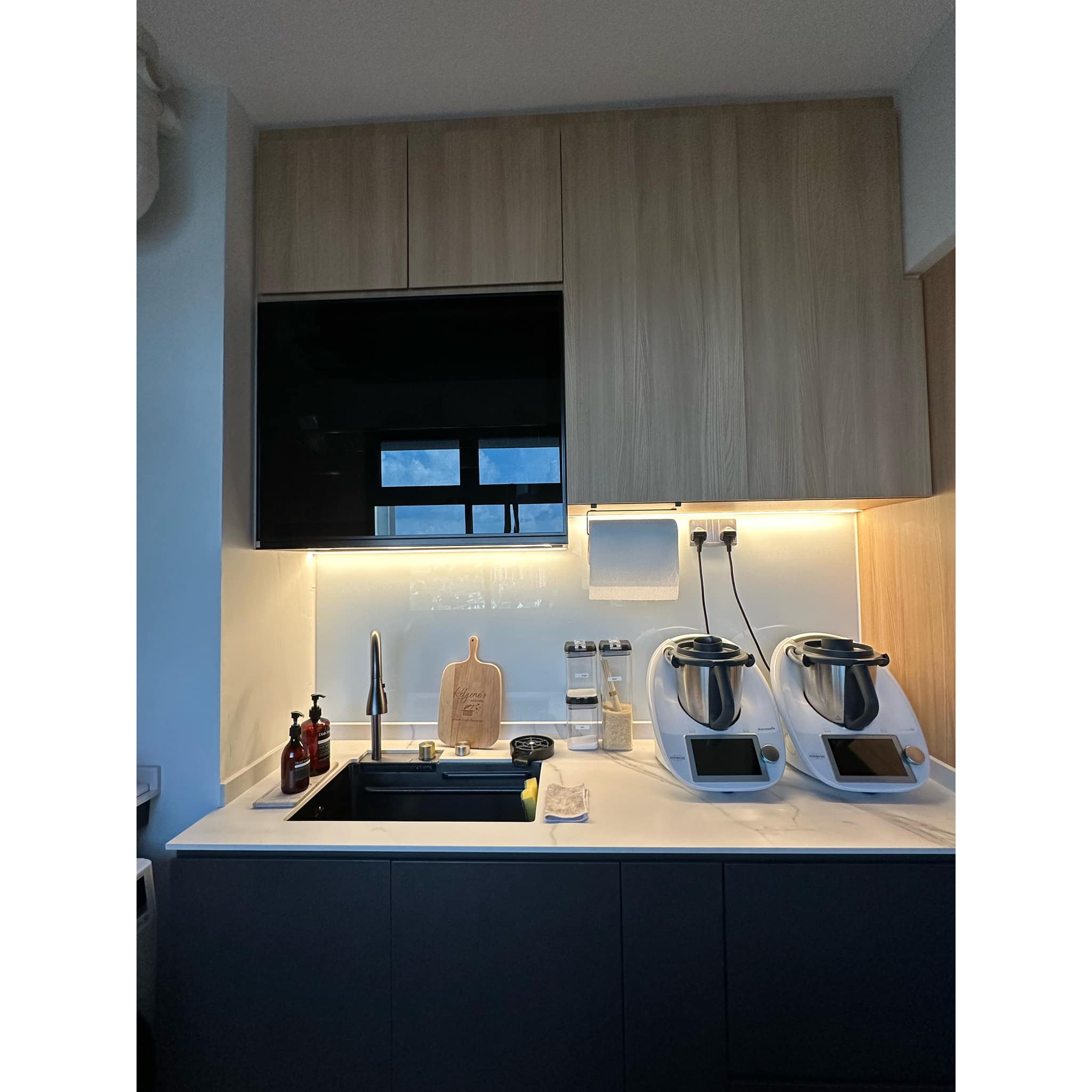 Organisation Lesson 101: 7 Tips To Getting Organised(Kitchen Edition)  - Modern kitchen with sleek design, wooden cabinets