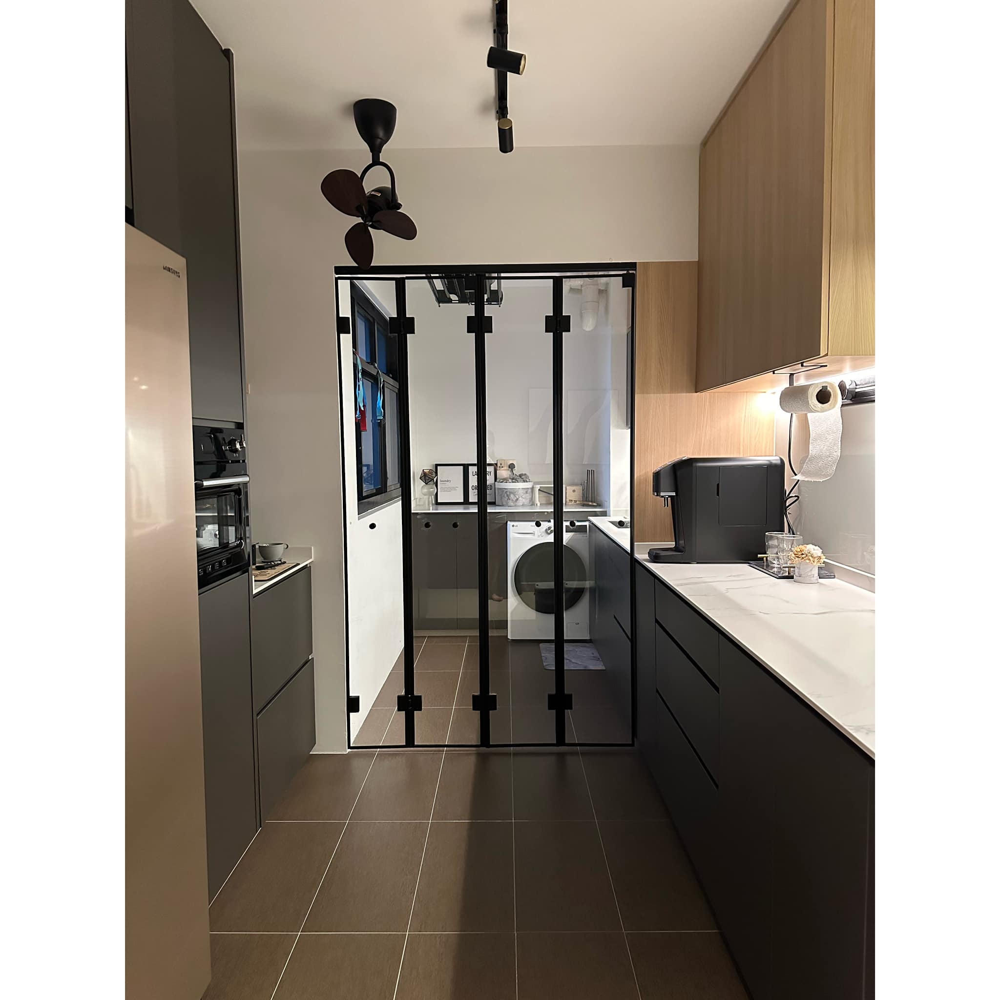 Organisation Lesson 101: 7 Tips To Getting Organised(Kitchen Edition)  - Modern kitchen with sleek appliances, black and