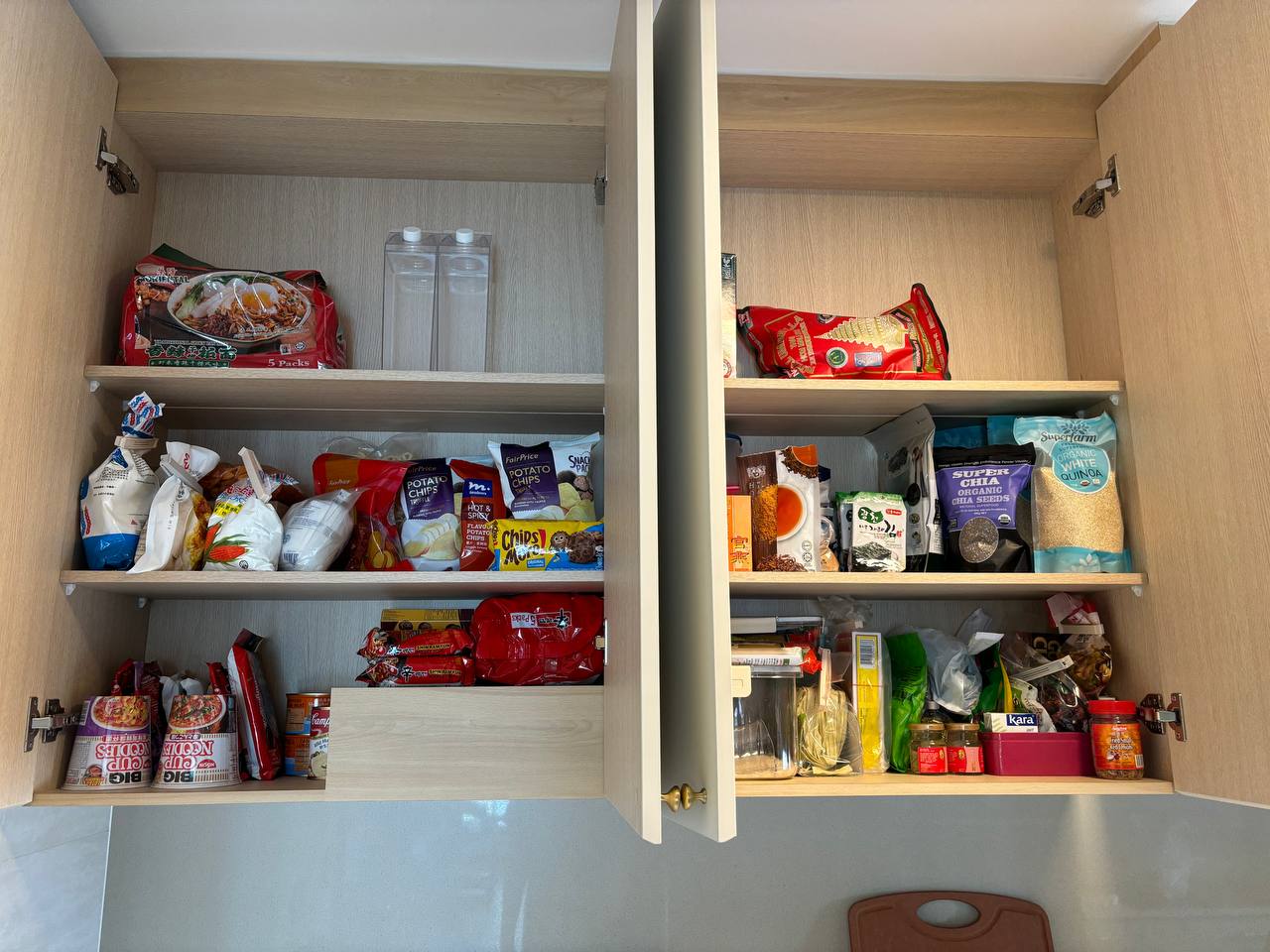 Utilising deep drawers & tower cabinet for Kitchen organisation - 5 packs instant noodles, red packaging, clear plastic