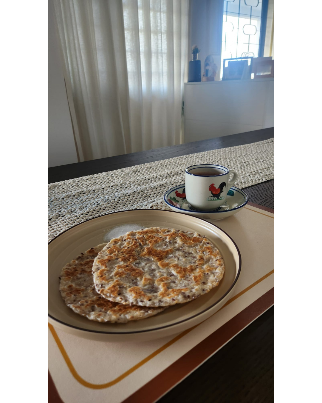 Hosting at Home: From 2 to 22  - home, dining room, breakfast, plate, pancakes, tea, cup, ceramic, rooster, white, blue