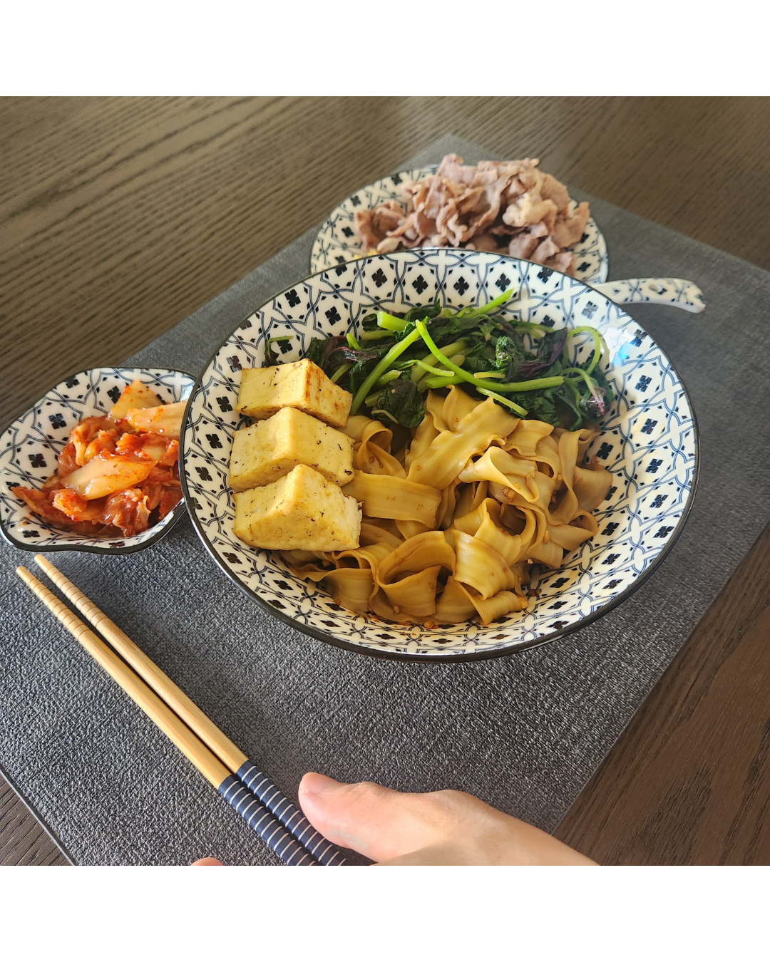 Hosting at Home: From 2 to 22  - Kimchi, tofu, noodles, green vegetables, red kimchi, chopsticks, wooden chopsticks, side