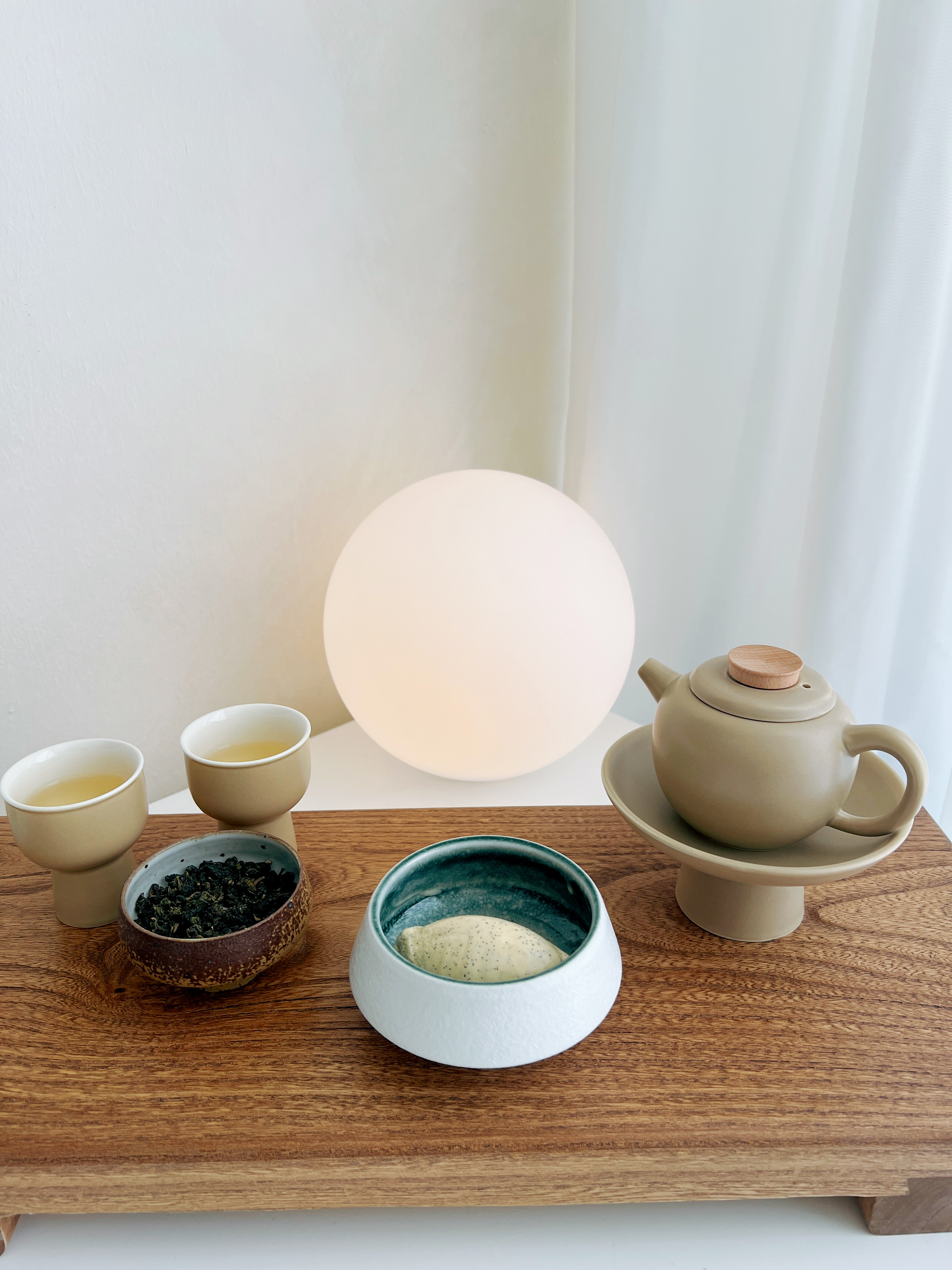 Slow Mornings And Quiet Comfort: My Weekend Routine - Tea set, minimalist design, wooden table, natural light, soft ambiance