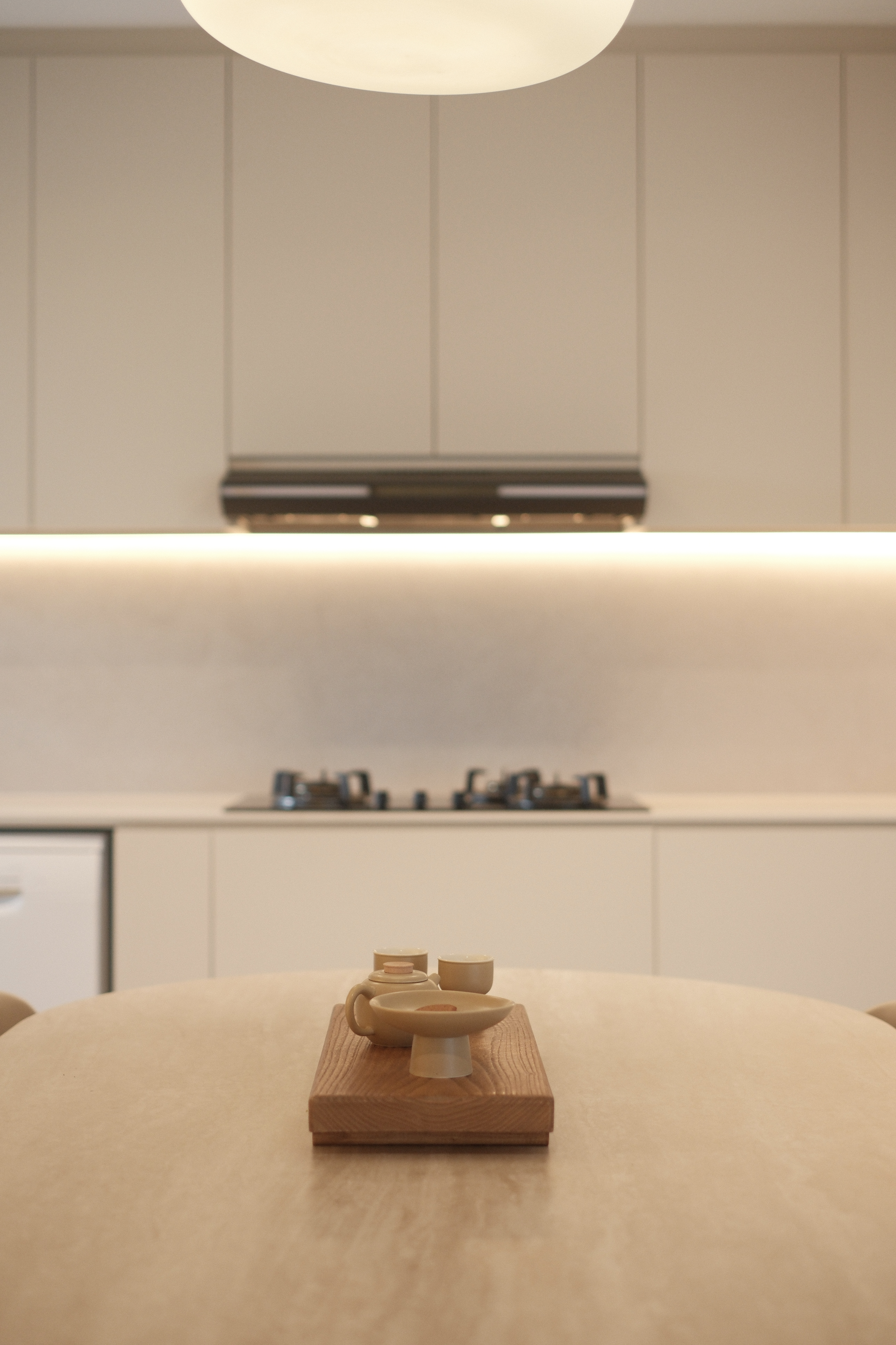 Slow Mornings And Quiet Comfort: My Weekend Routine - Modern kitchen, minimalist design, sleek cabinetry, pendant light