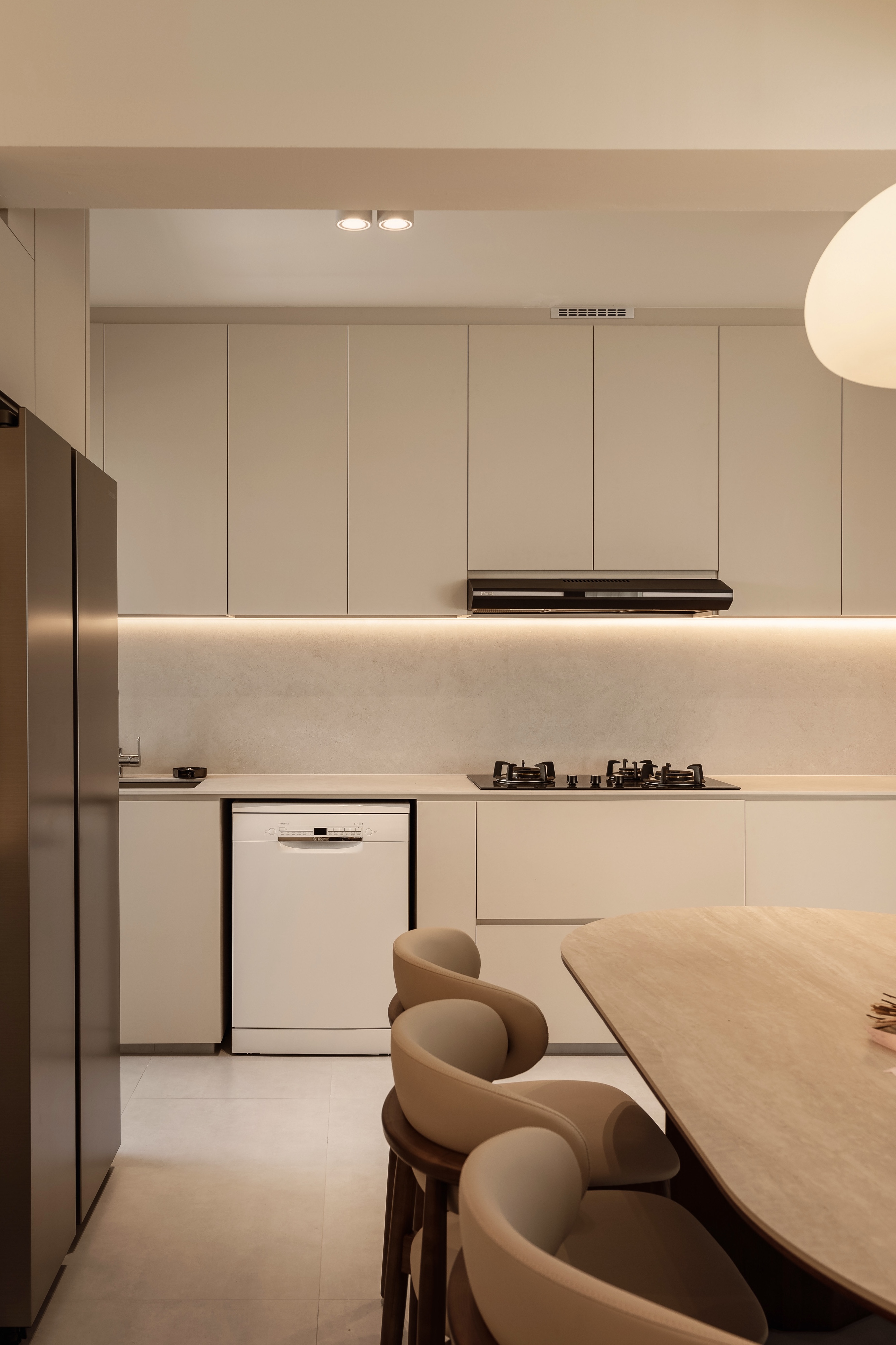 My Best Home Investments: The Luxuries I Didn't Know I Needed - Modern kitchen with sleek design, minimalist decor, neutral