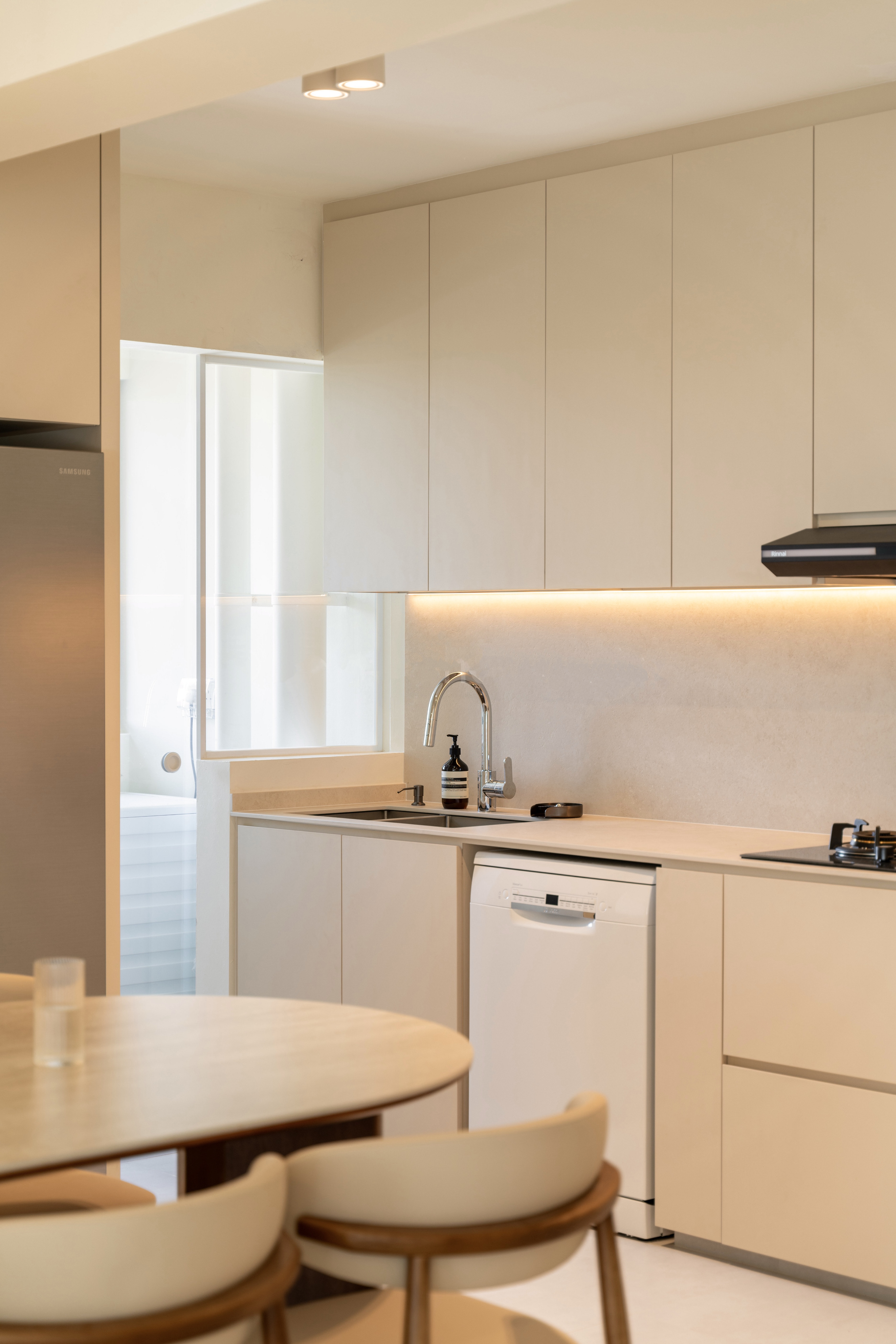 My Best Home Investments: The Luxuries I Didn't Know I Needed - Modern kitchen with sleek design, minimalist decor, neutral