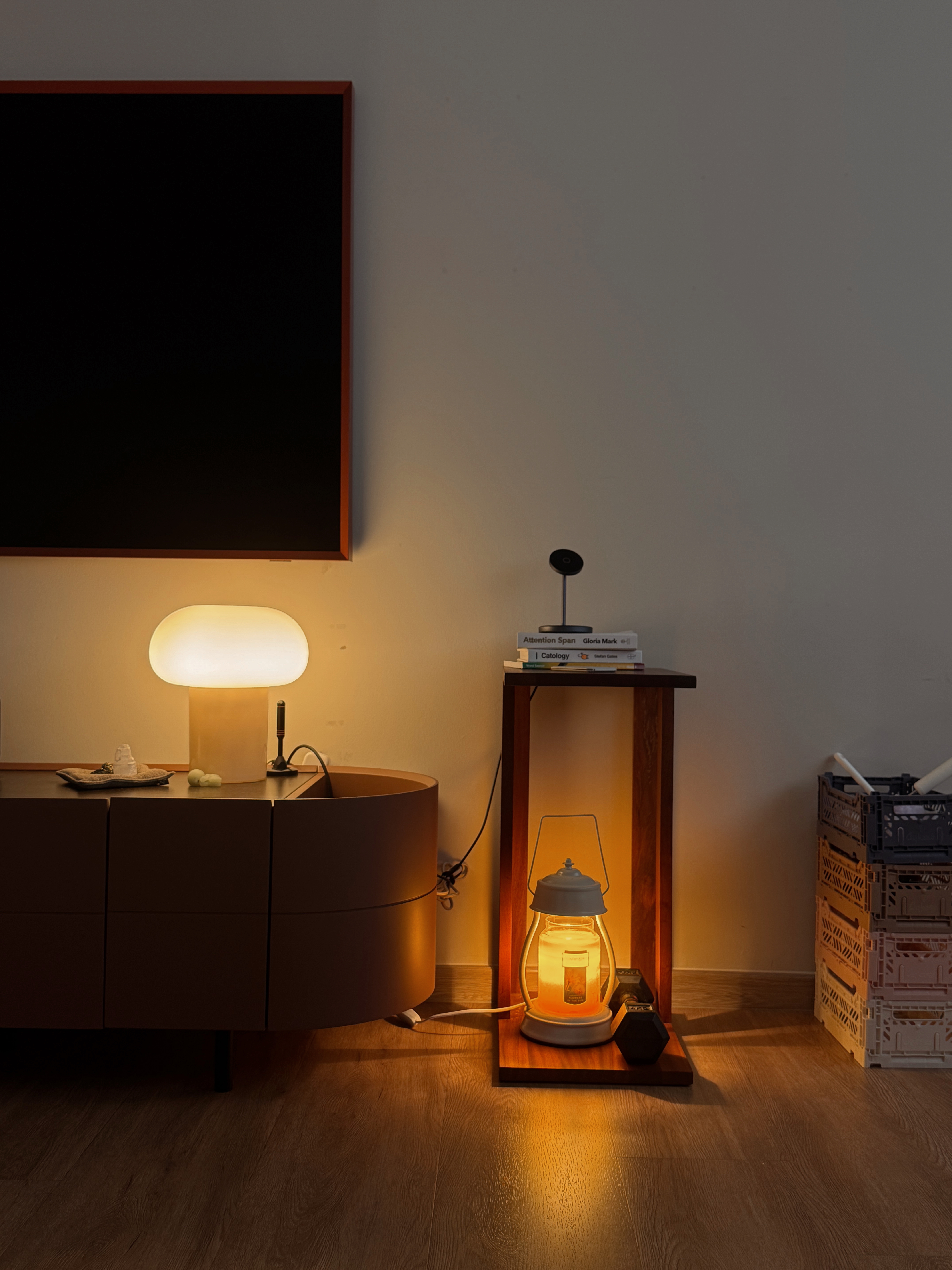 Hosting Tips to Make Guests Feel at Home - dimly lit room, cozy corner, modern decor, wooden cabinet, soft ambient light