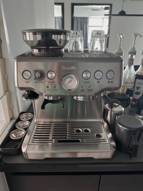 Hit us up if you'd like to have a coffee chat! - Modern espresso machine, stainless steel finish, Breville brand, control