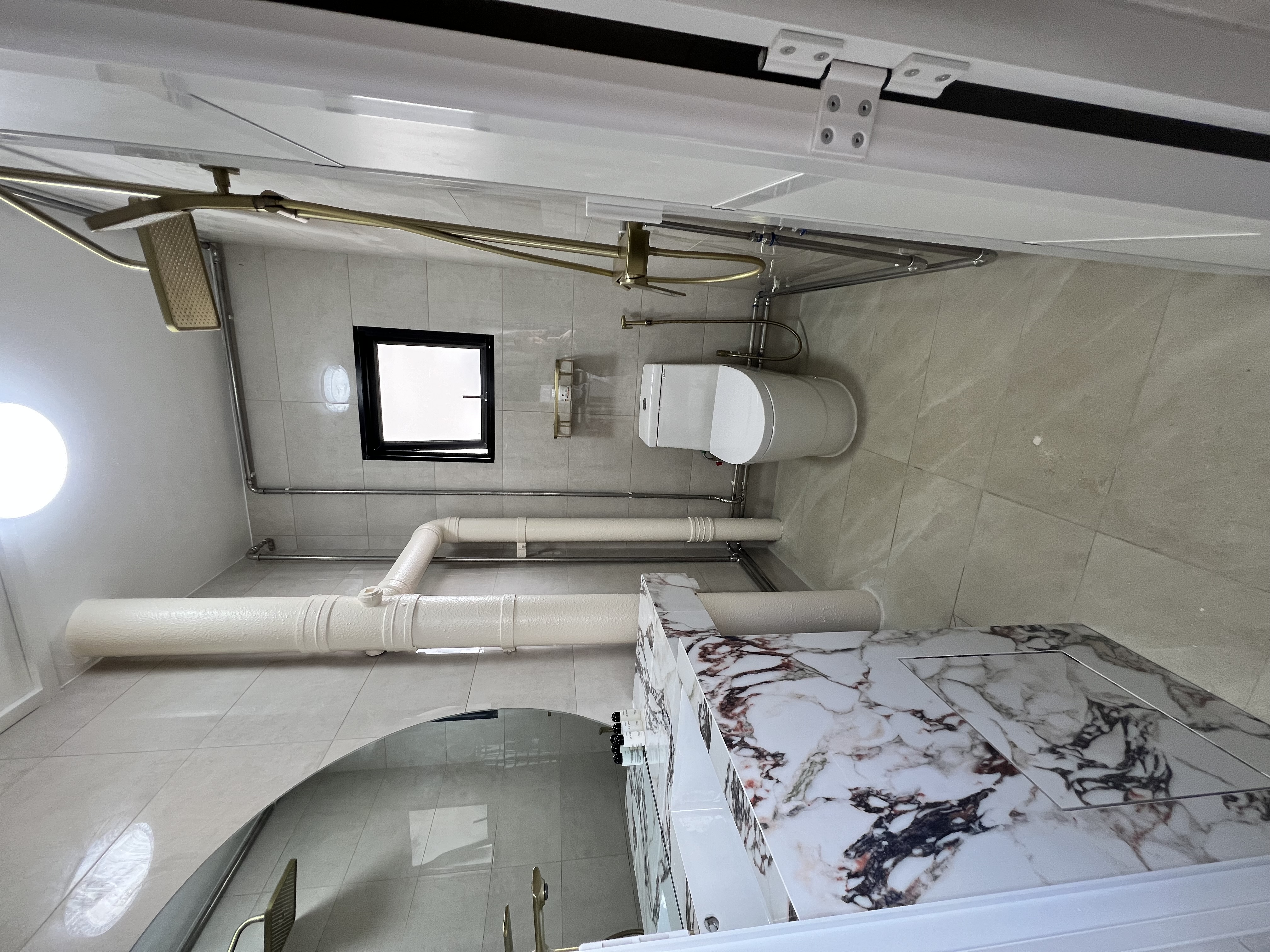 Desert Dreams: A Dune-Inspired Oasis with a Bold Vanity! - Modern bathroom with sleek design, white tiled walls and floor