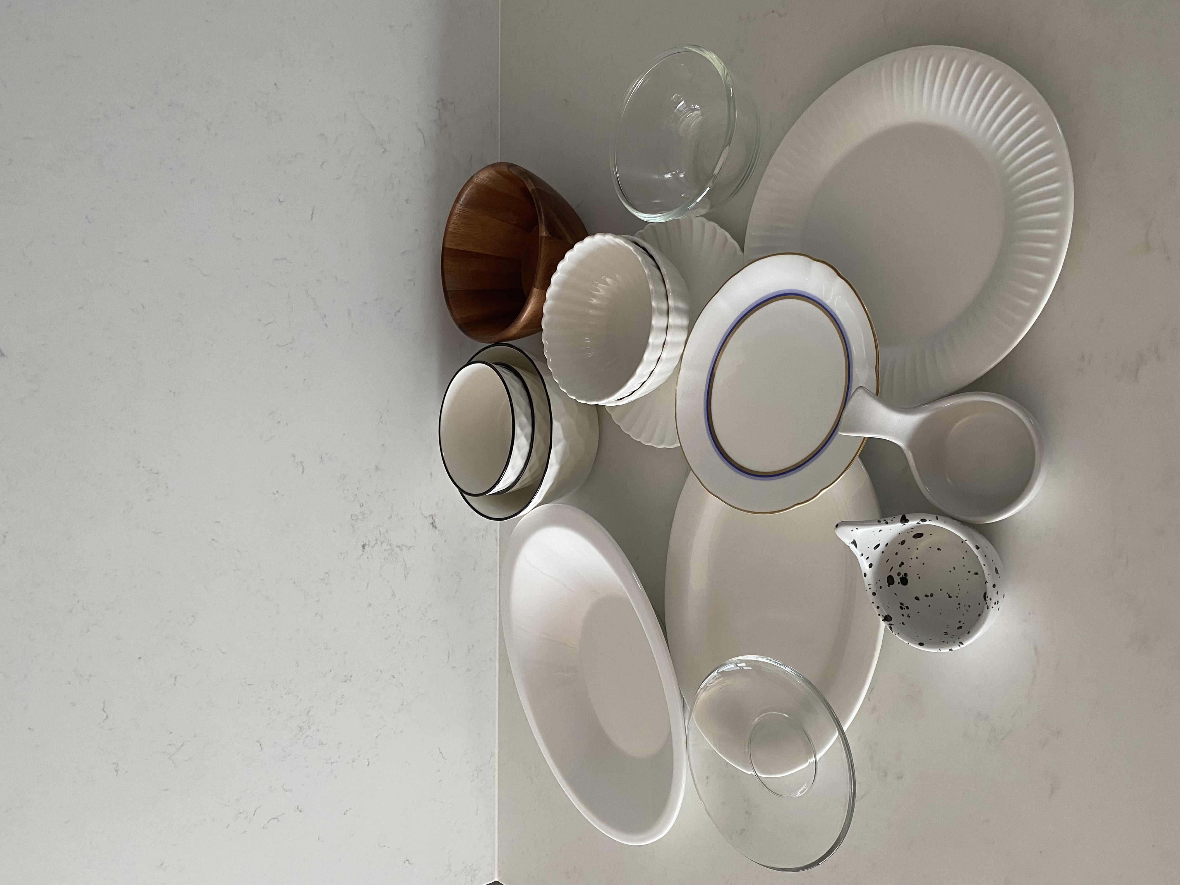 Aesthetic decorative, functional homewares at our place - White ceramic dinnerware, modern dining setup, minimalist design