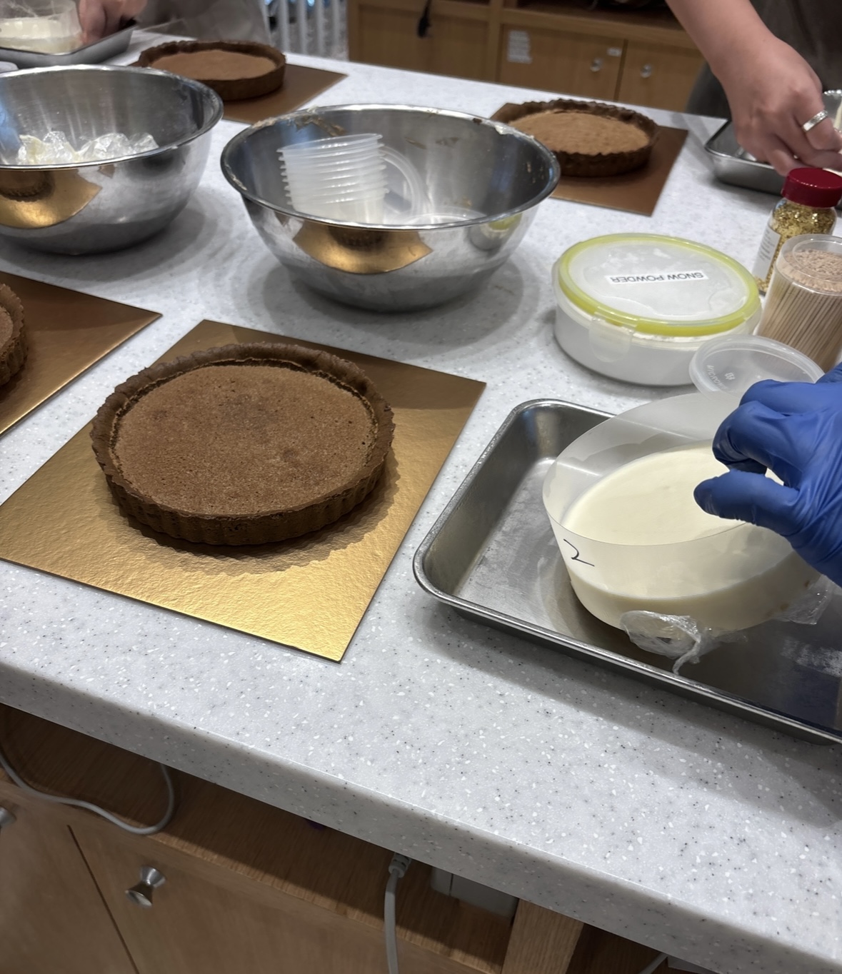 Our simple weekend routine 💖 - golden tray, round chocolate cake, professional baking, hands in blue gloves, white frosting