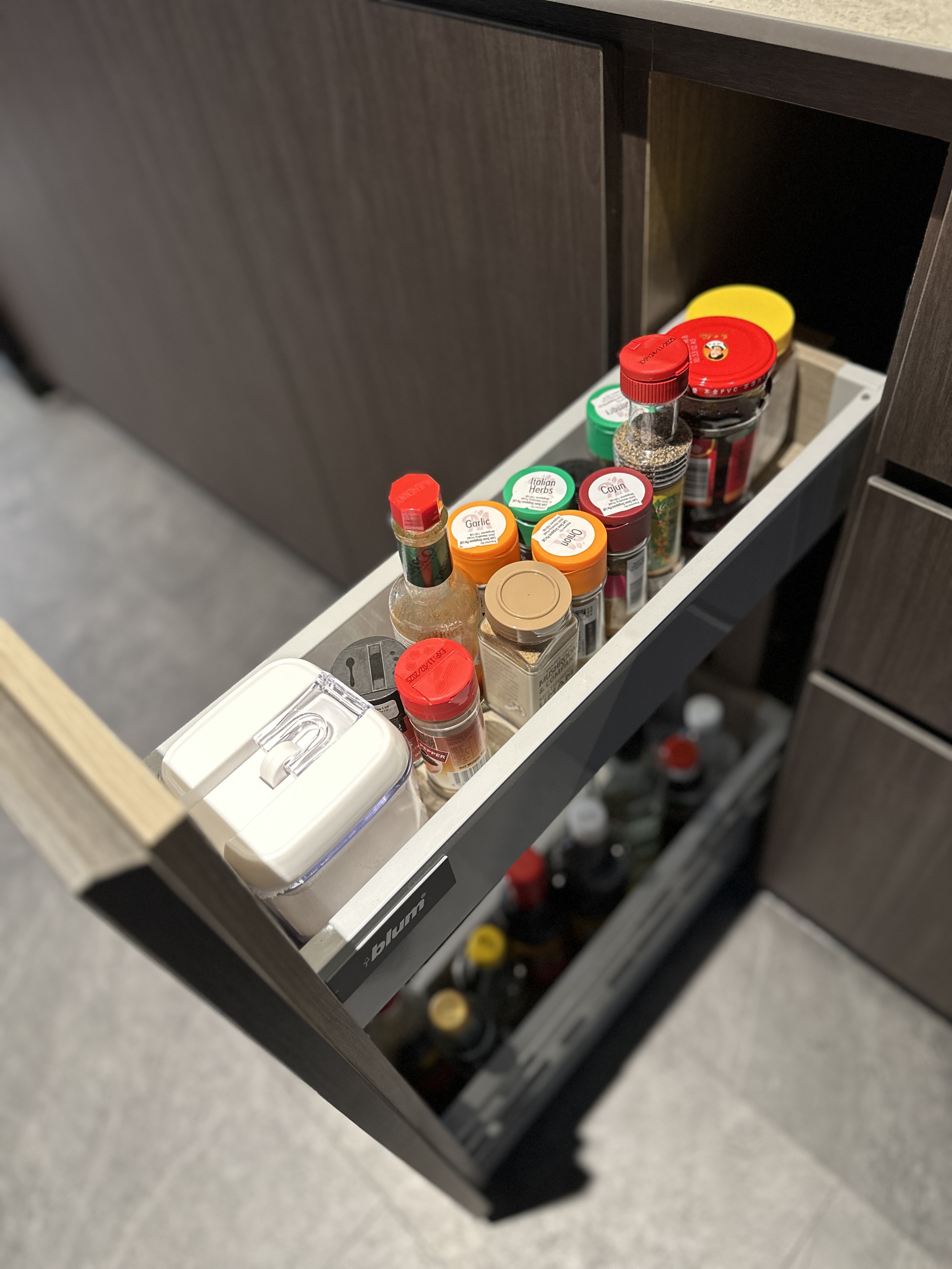 Maximizing Space with Style: Our Minimalist Luxe Kitchen Setup - wooden kitchen drawer, spice rack, organized spice