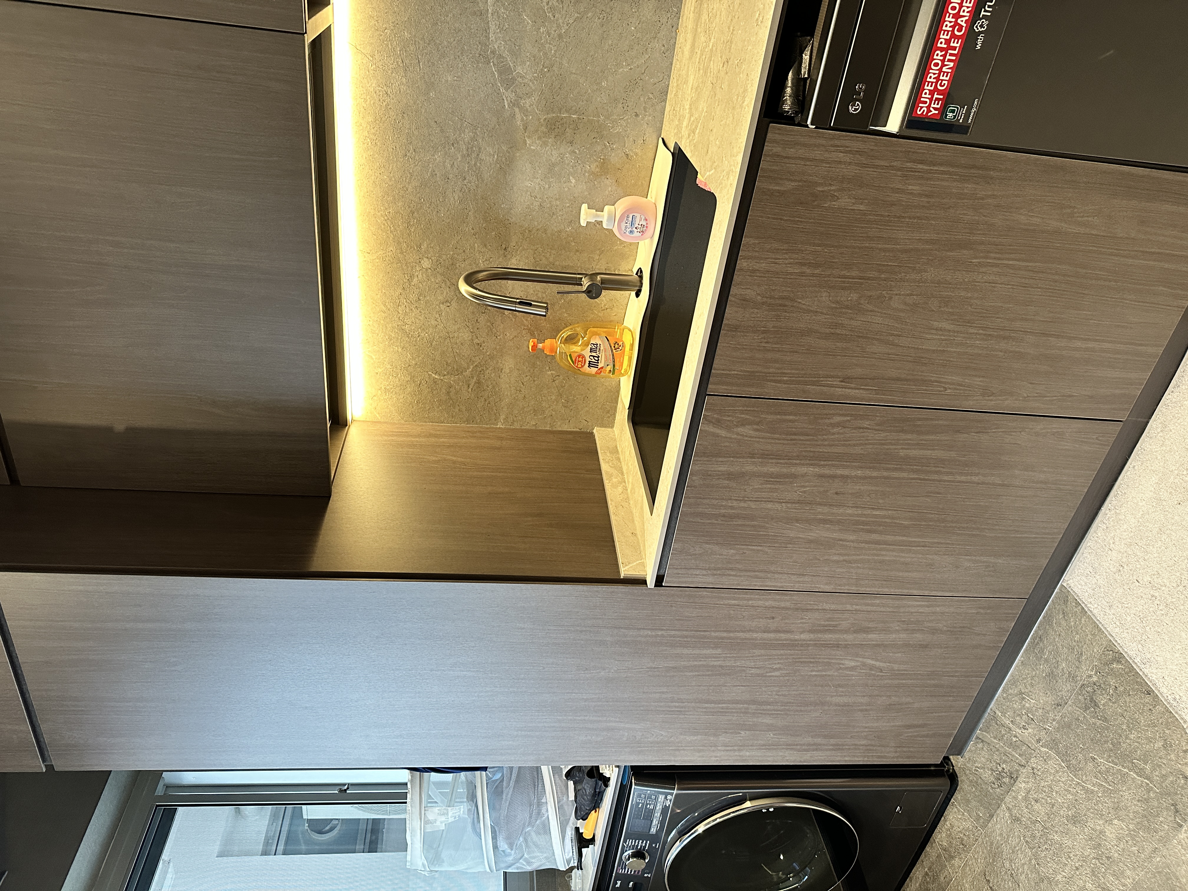 Maximizing Space with Style: Our Minimalist Luxe Kitchen Setup - modern kitchen countertop, stainless steel sink