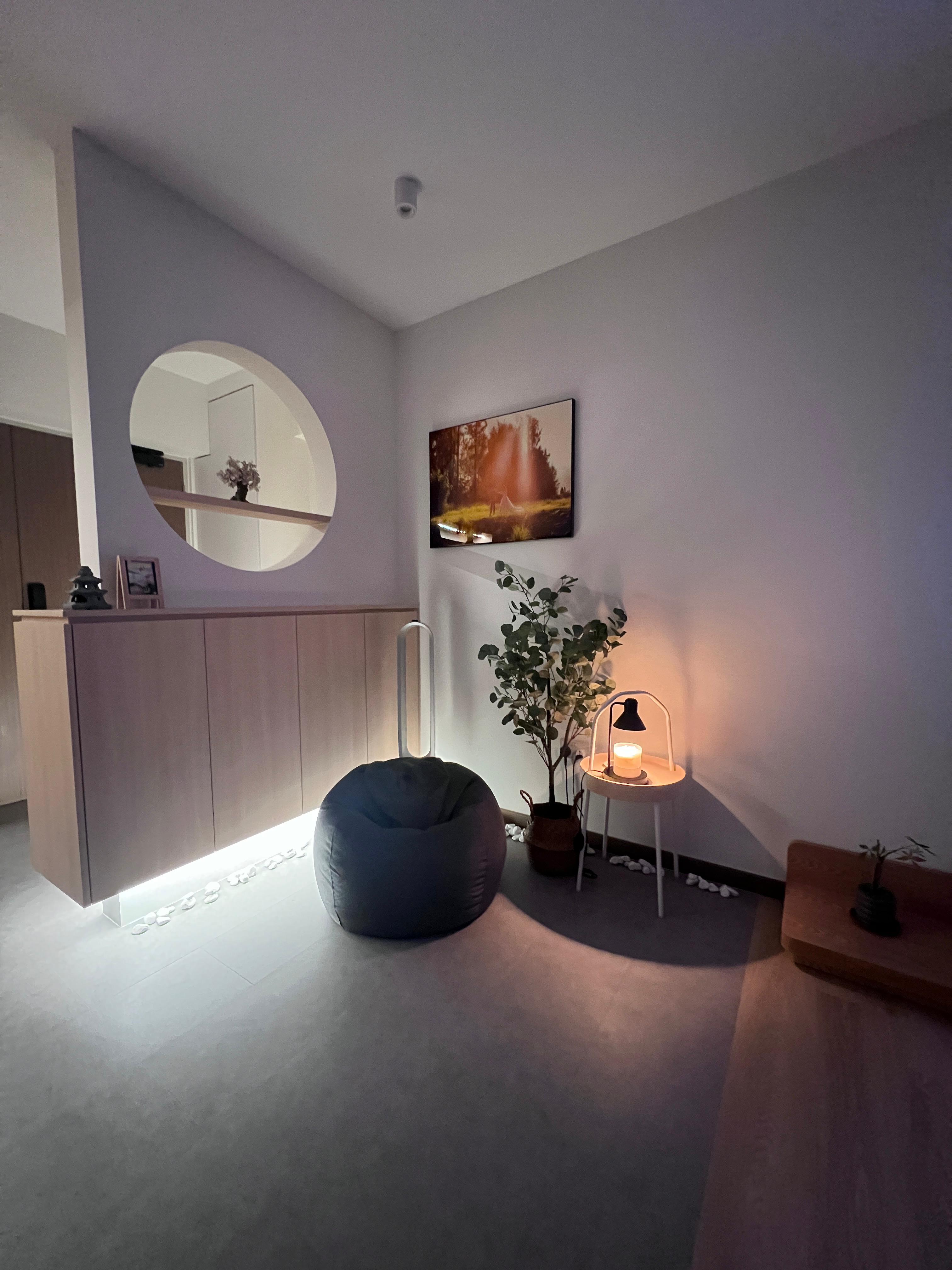 Cozy corner for a warm cup of tea and a good book  - Modern minimalist living room, cozy ambiance, soft lighting, serene