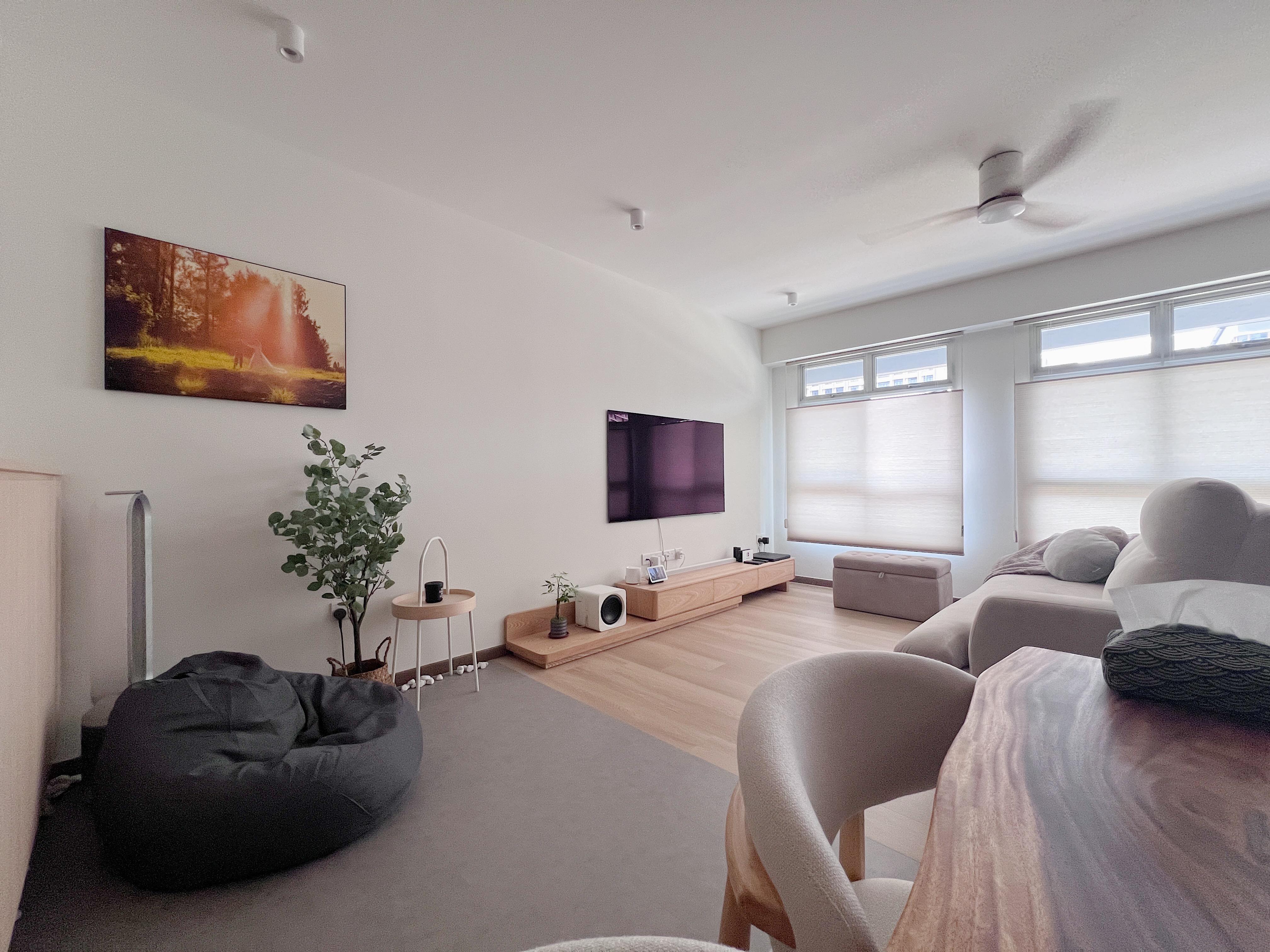 Cozy corner for a warm cup of tea and a good book  - Modern living room with minimalist design, large flat-screen TV