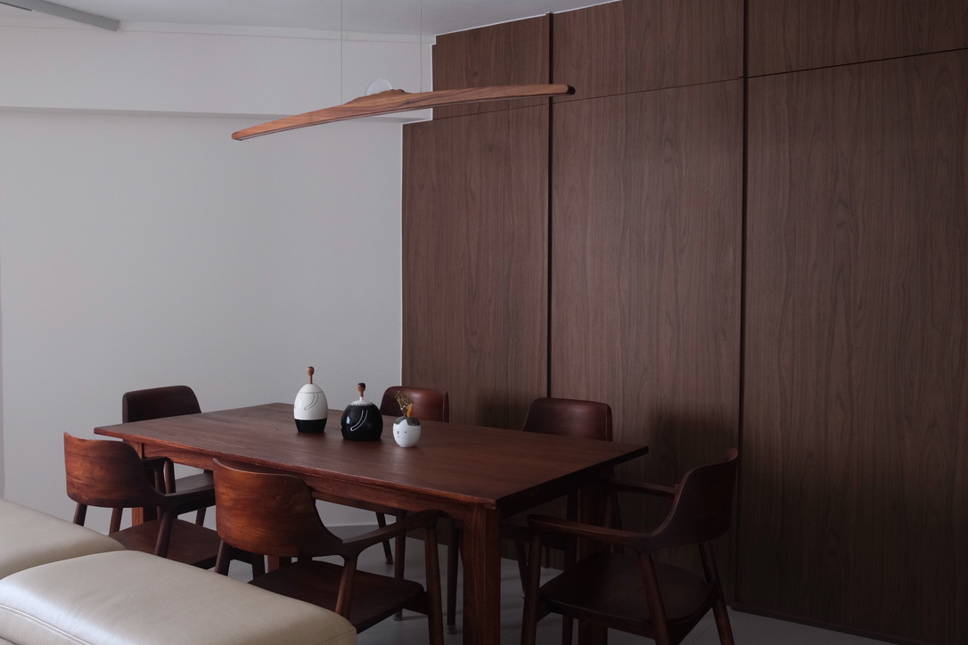 Why We Chose to Invest in an ID - Wooden dining table, minimalist design, modern decor, wooden chairs, sleek furniture