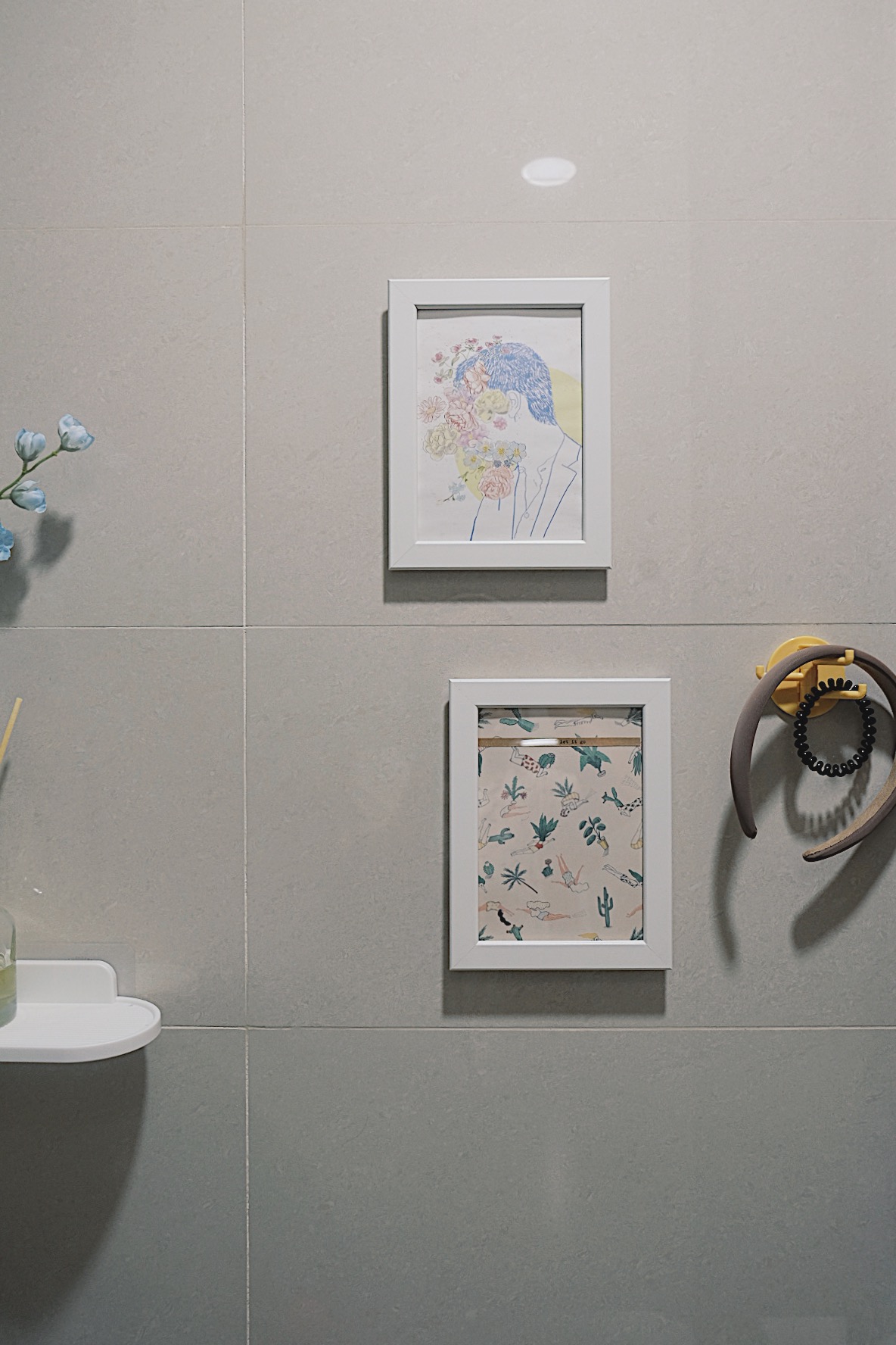 Styling our bathrooms with framed magazine cutouts - Tiled wall, framed artwork, abstract art, minimalist decor, modern