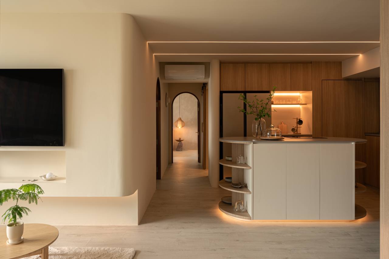 Home Sanctuary: Living Room - Modern minimalist living room, sleek entertainment center, warm ambient lighting, open-concept