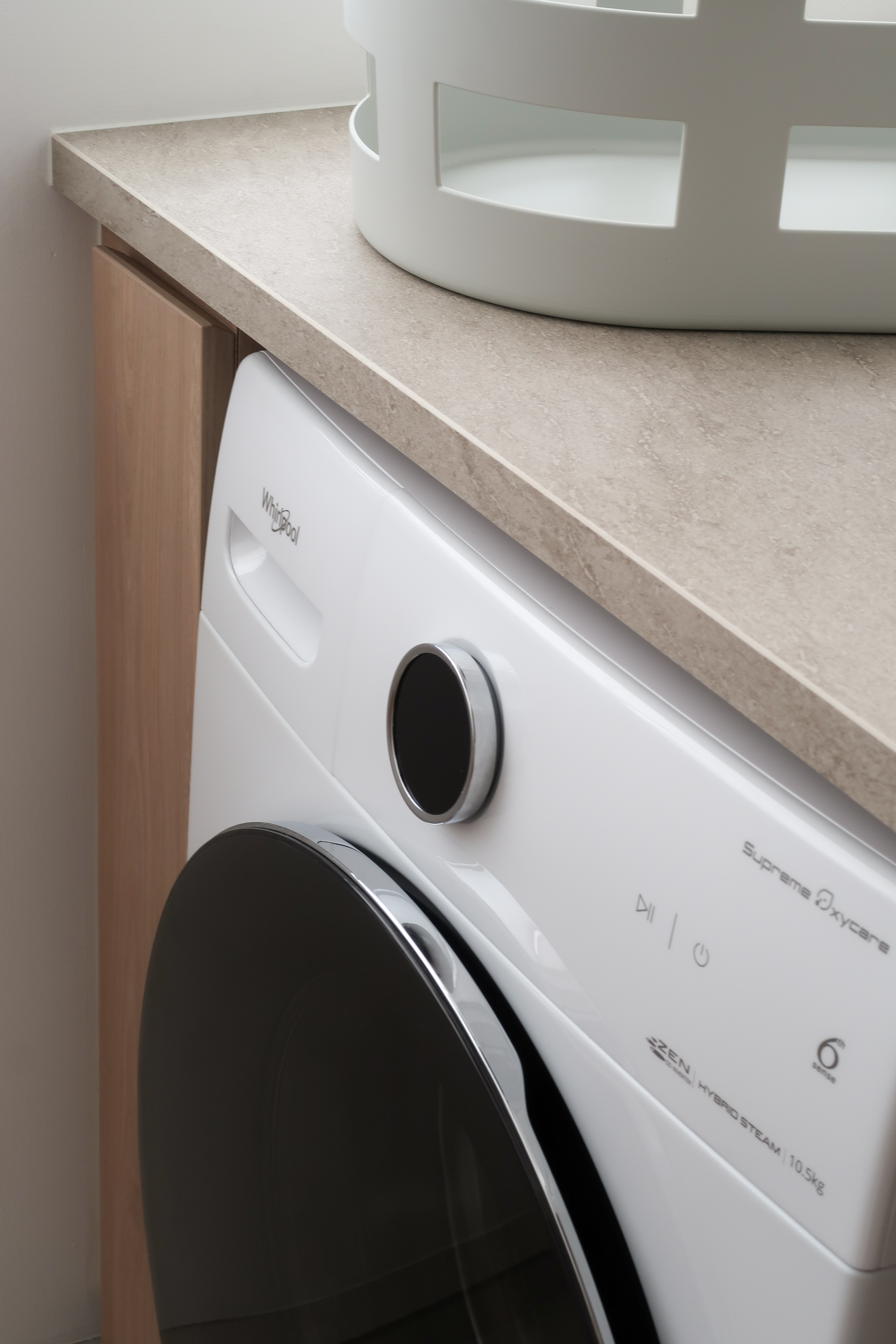 Service Yard: Making the Most of Small Spaces - White washing machine with control panel, minimalist design, front-loading