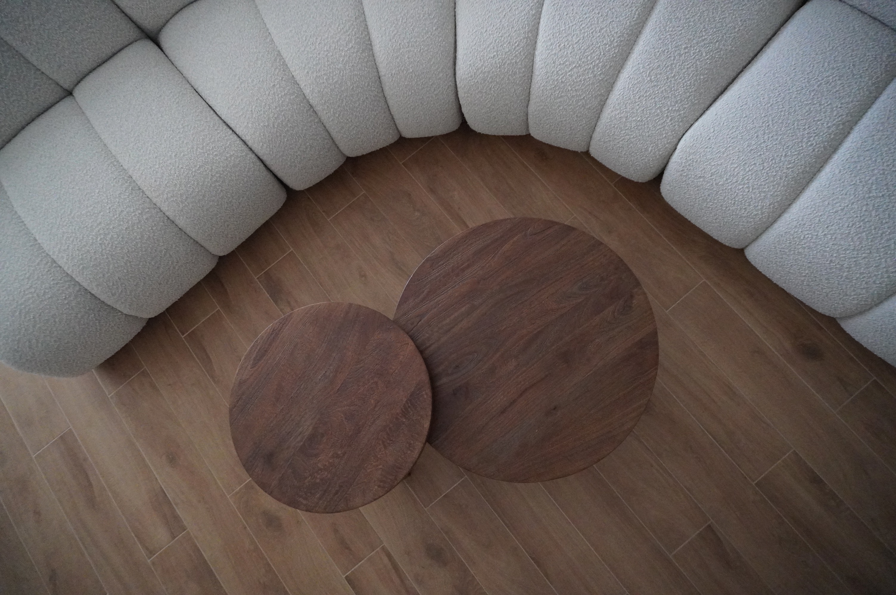 From Barn Door to Panels: Inside Our Modern Farmhouse Living Room - Cream upholstered sectional sofa, wooden round coffee