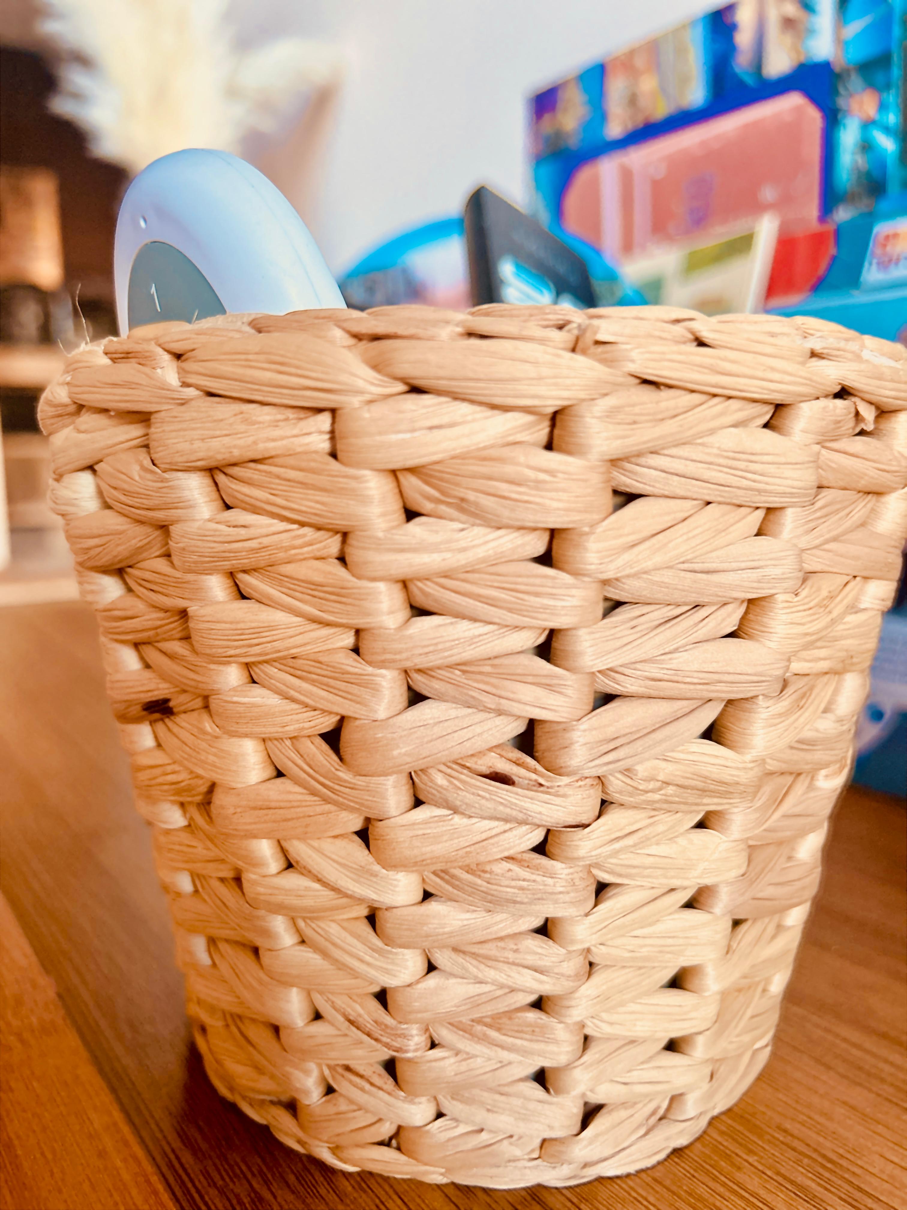 Inside our $26k Boho-Mediterranean 4-Rm BTO in shades of Terracotta - Wicker basket, woven texture, light brown color, wooden