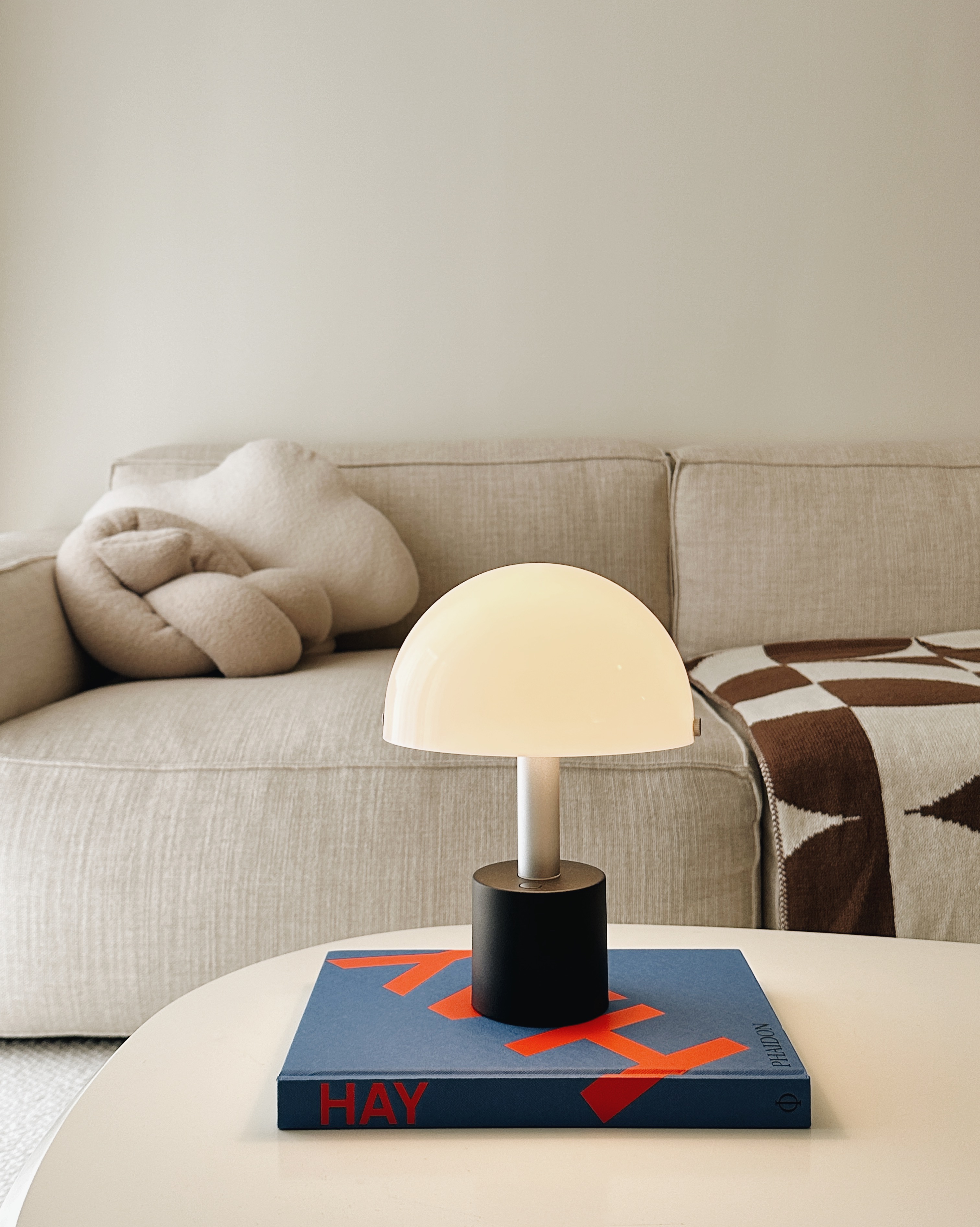 ⁠Modern Minimalist: A Peek into My Living Room - Modern minimalist living room, cozy sofa, beige cushions, soft lighting