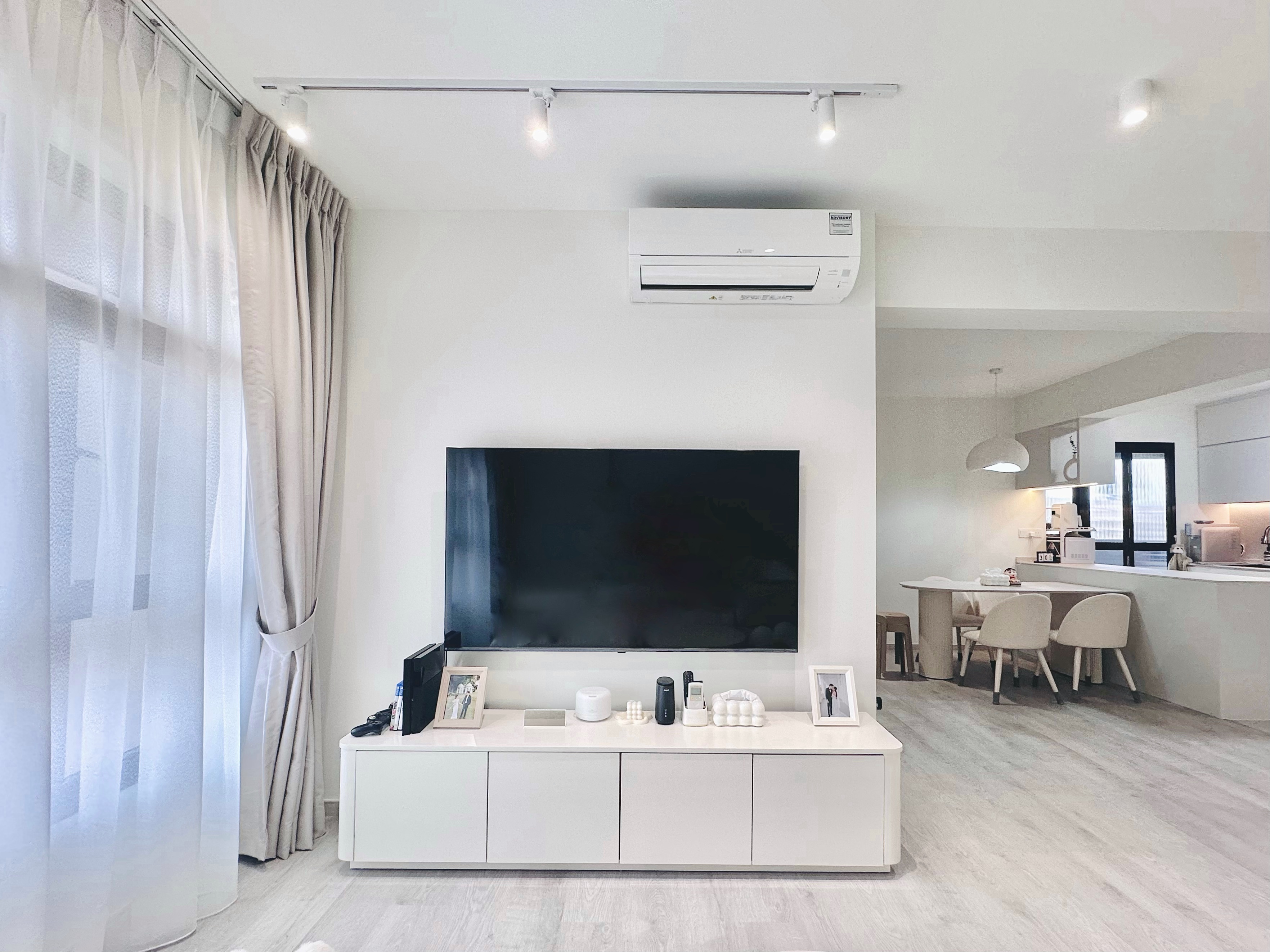 Tranquil white haven at Tengah under 34K  | Living room  - White modern living room with minimalist design, large