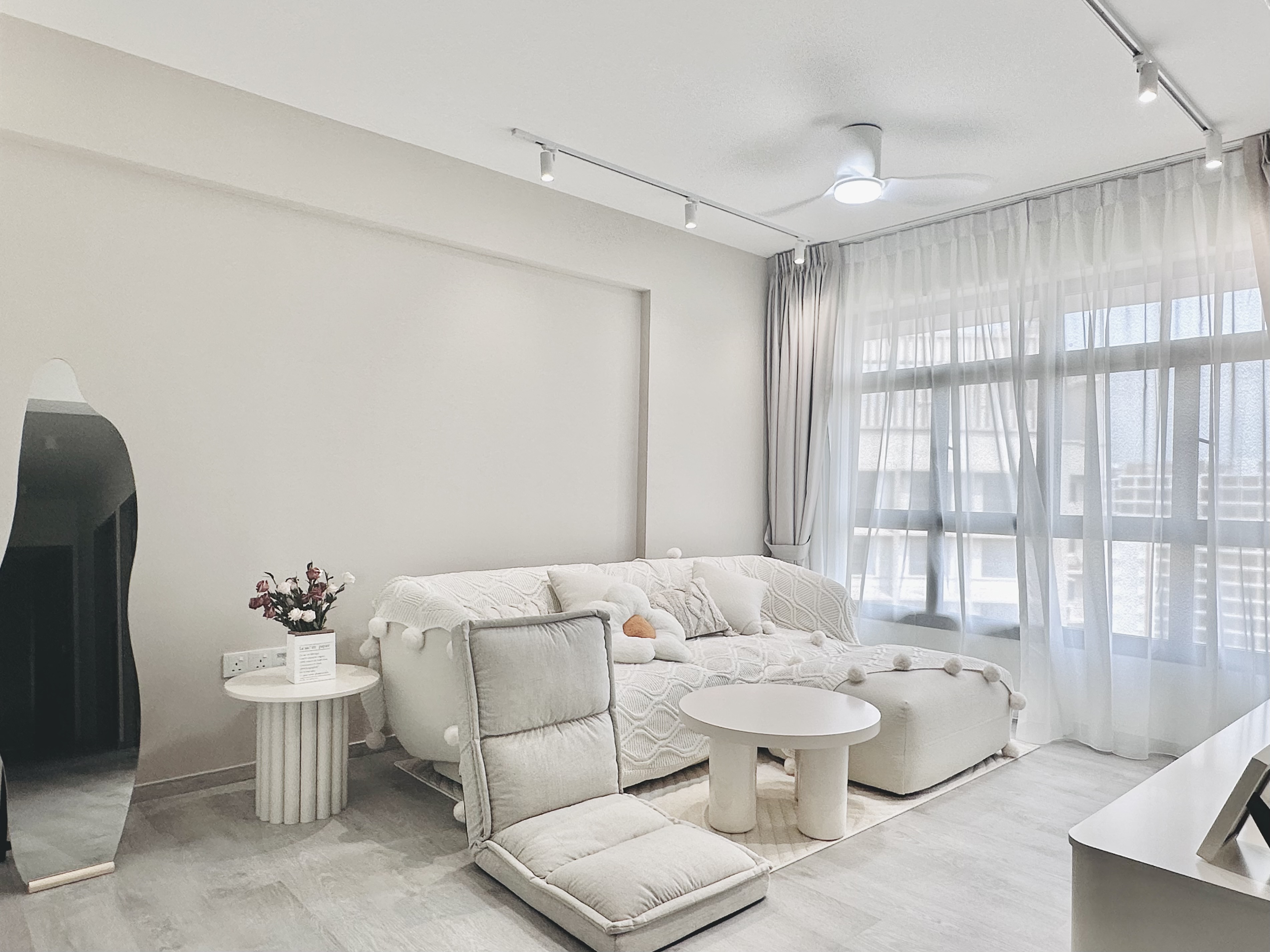 Tranquil white haven at Tengah under 34K  | Living room  - Modern minimalist living room, neutral color palette, large