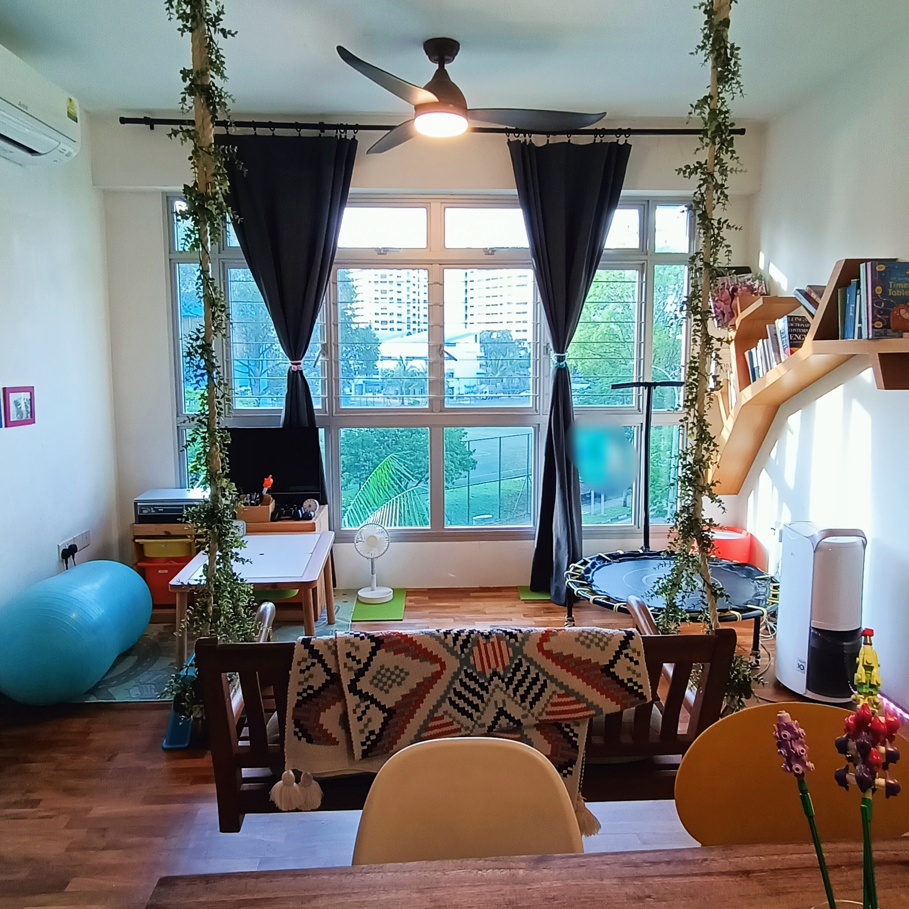 Serenity Oasis: Garden Theme Living Room (Complete with a swing) - Large windows, indoor plants, cozy room, wooden furniture
