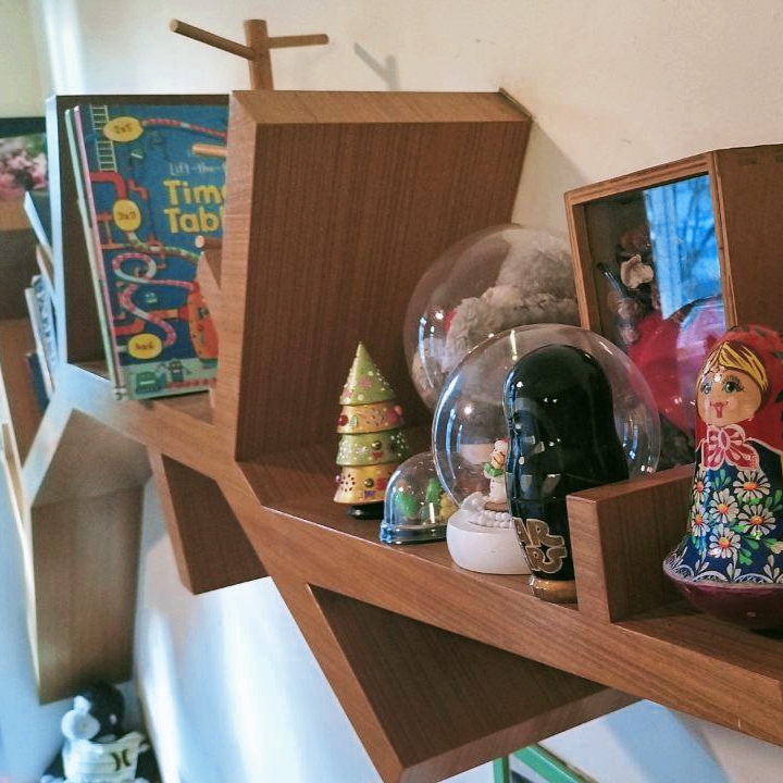 Serenity Oasis: Garden Theme Living Room (Complete with a swing) - Christmas tree, snow globe, Russian doll, book titled