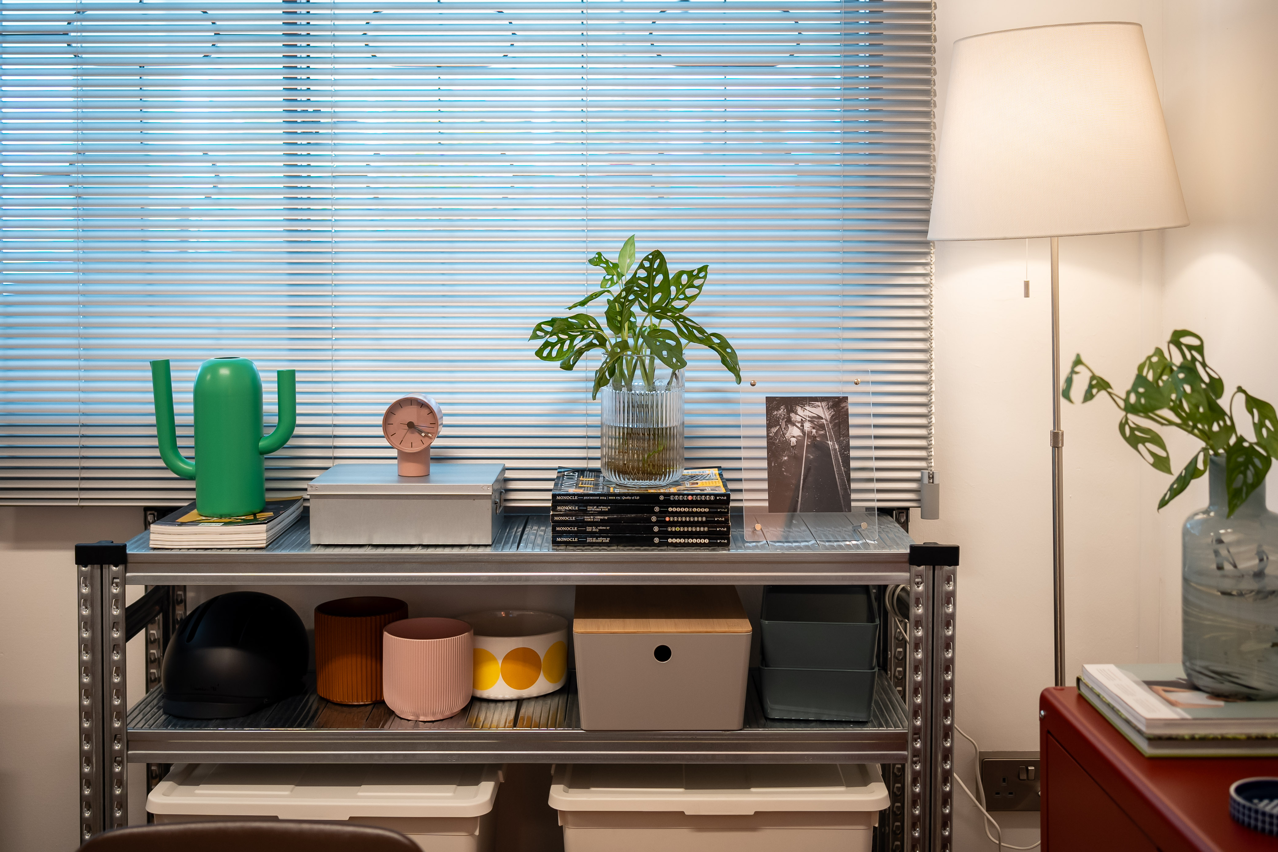 Inside a Photographer’s Vibrant Living Room Studio with Eclectic Charm - Modern workspace, minimalist decor, green cactus