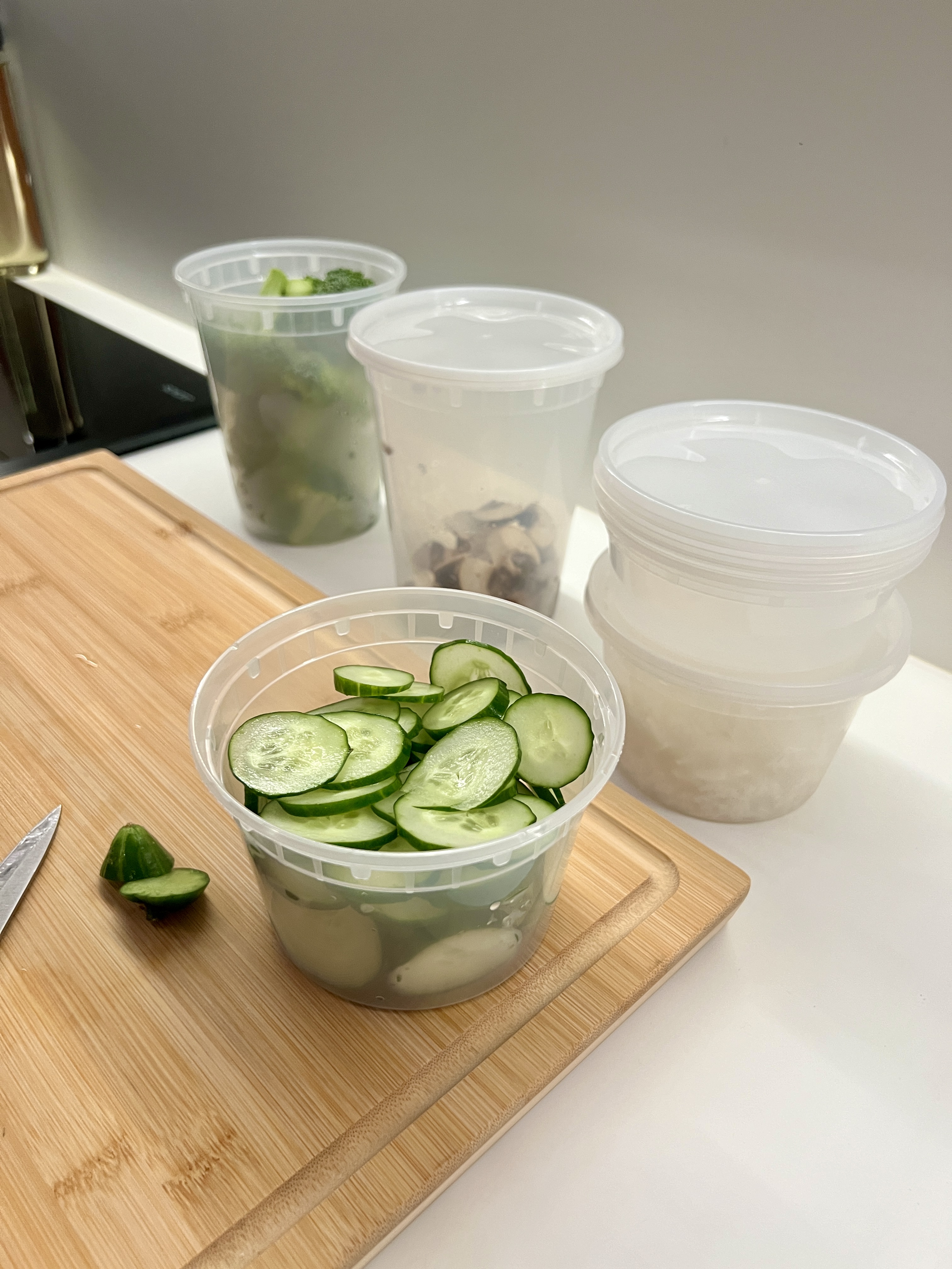 Optimising the kitchen experience for 2 monkeys 🙉🙊 - fresh cucumber slices, sliced cucumbers, green vegetables, vegetable