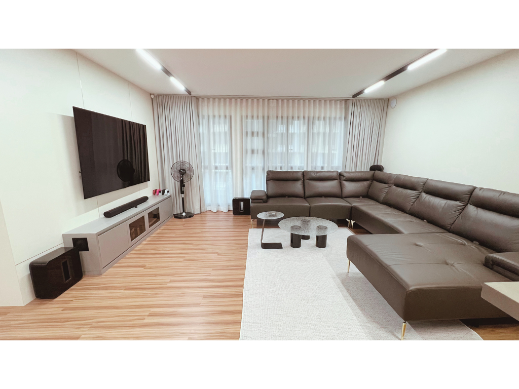 Living Room | Simple and Stylish | 5rm BTO in Tampines - Modern living room with large flat-screen TV, brown leather