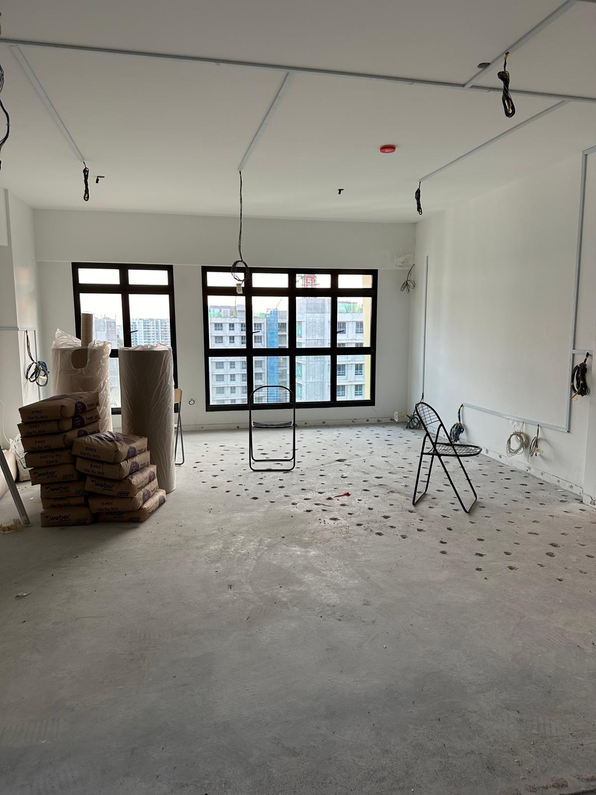 Before & After: Japandi Luxe Living Room ($210k reno) - Empty room with concrete floor and exposed wiring, Construction site