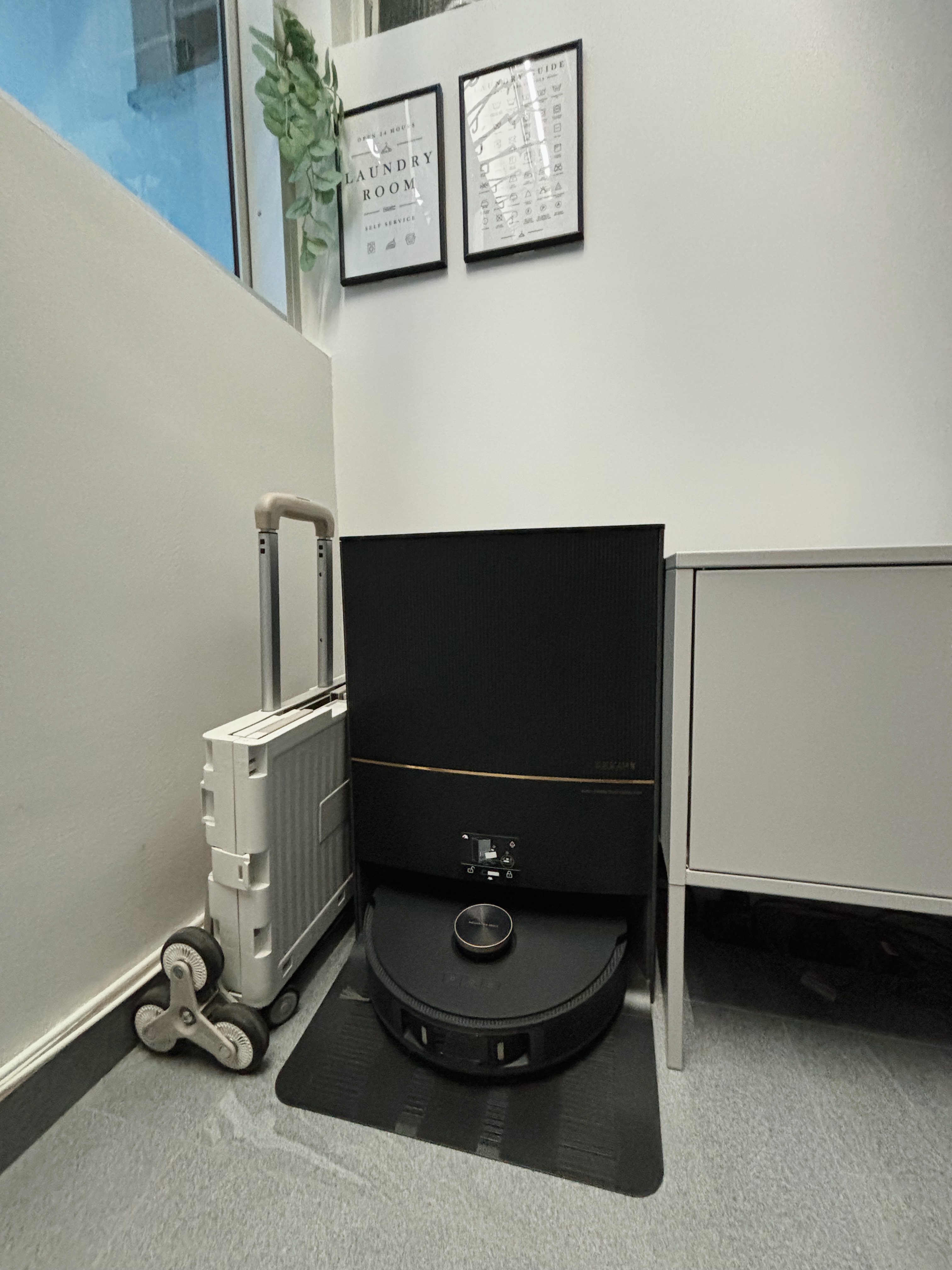 How We Made Our Service Space Work for Us - laundry room, self-service, rolling cart, black appliance, ergonomic design