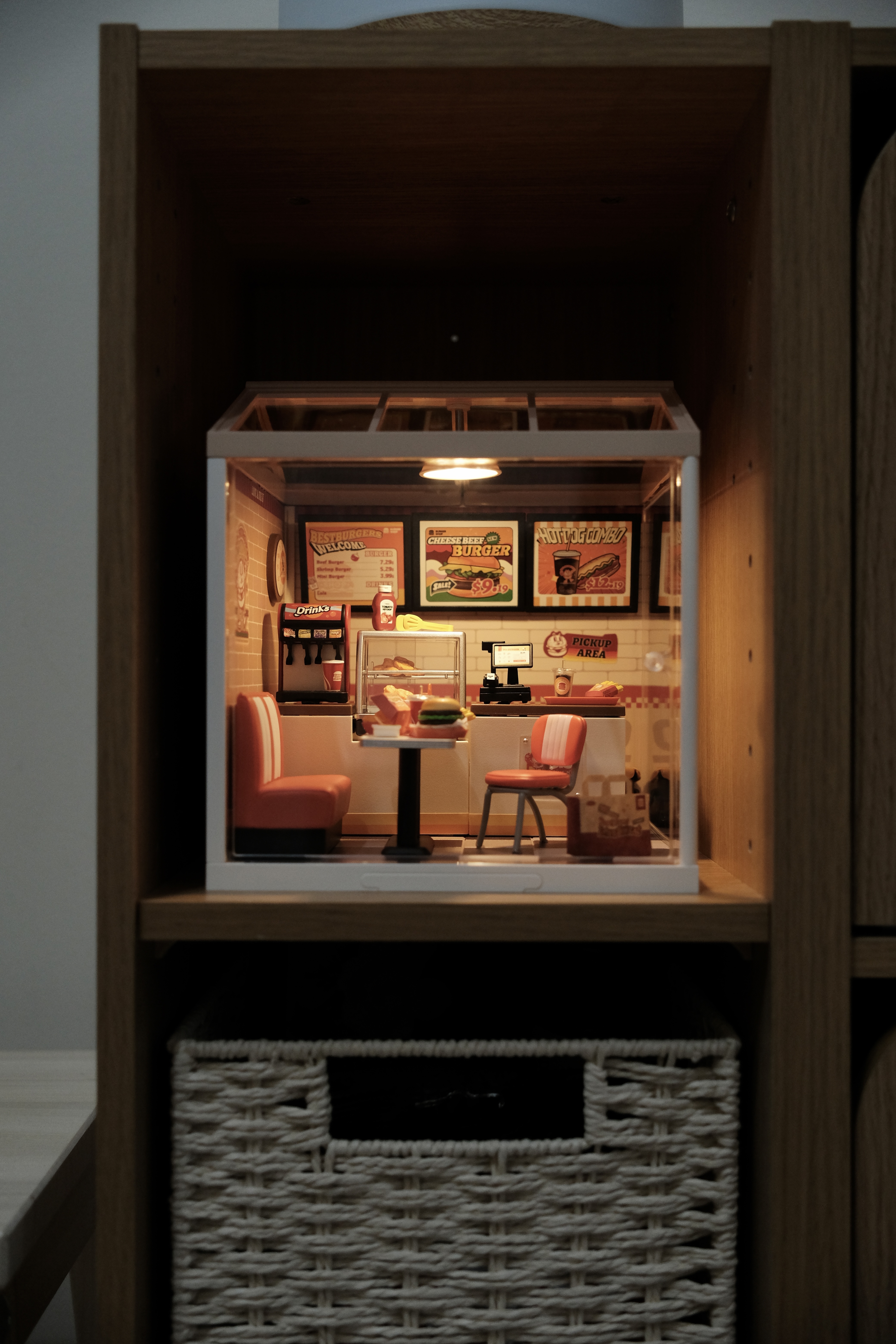 Inviting you to step into our favorite haven in the house! ✨ - Miniature model of a vintage diner interior, featuring a