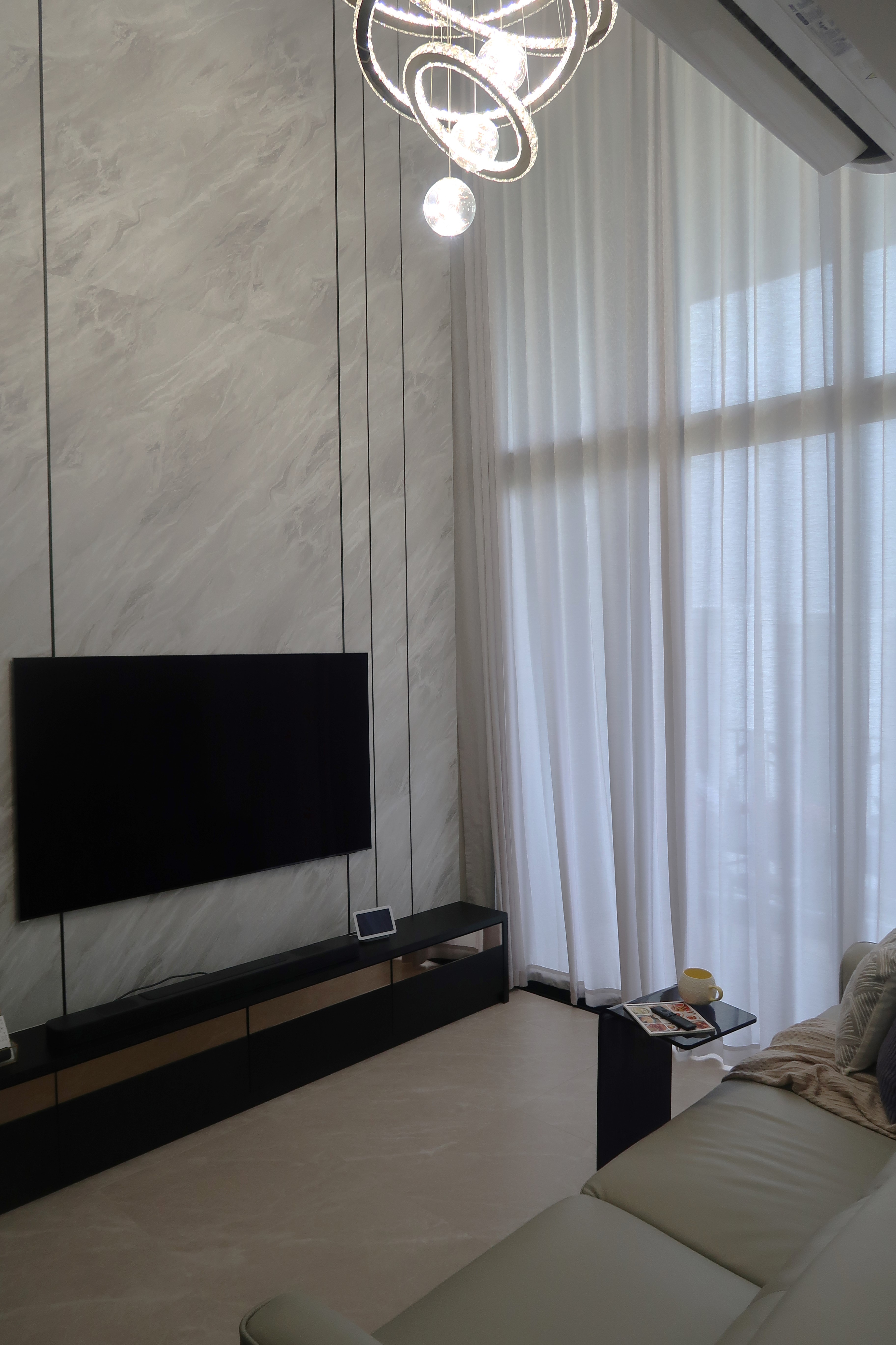 Simple and Sleek High Ceiling Living Room: Modern Dark Loft at North - Modern living room, minimalist design, large