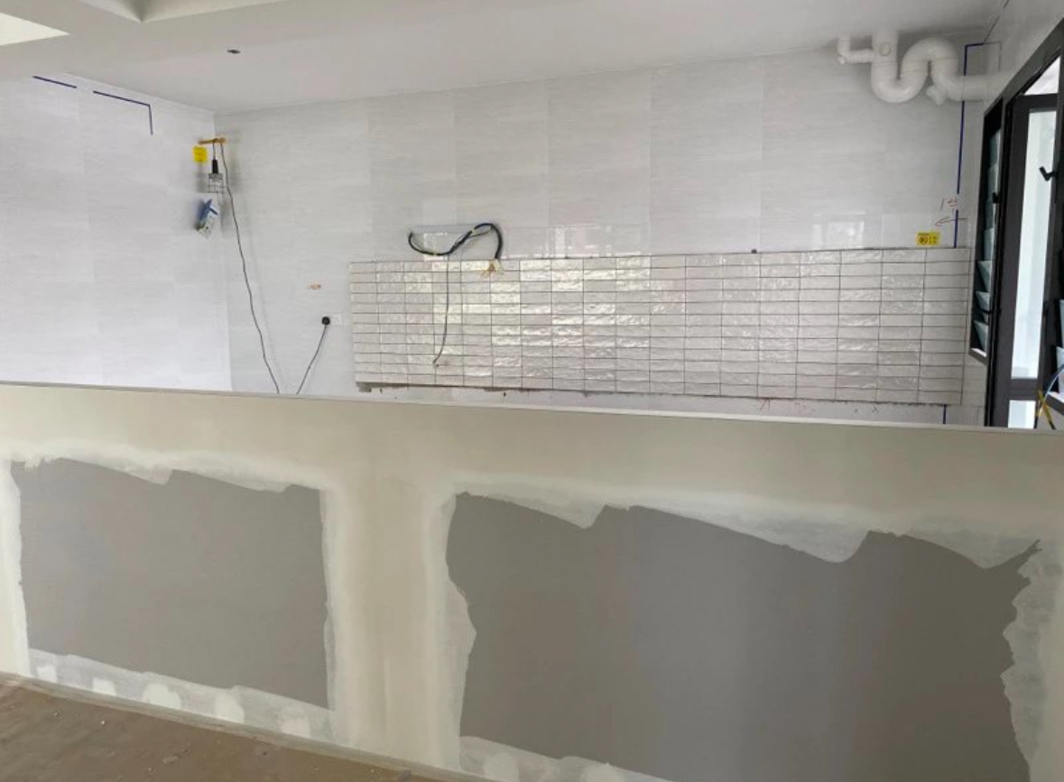 Before and After: All about the Details! - White tiled walls, unfinished ceiling, exposed pipes, electrical wiring