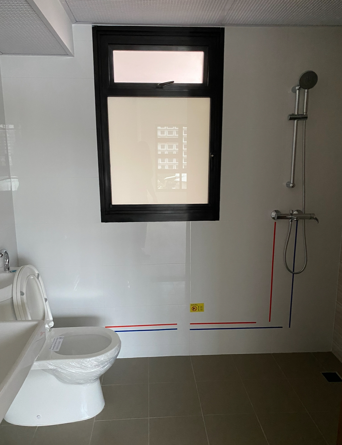 Before and After: All about the Details! - White bathroom with modern fixtures, tiled floor and walls, large window with